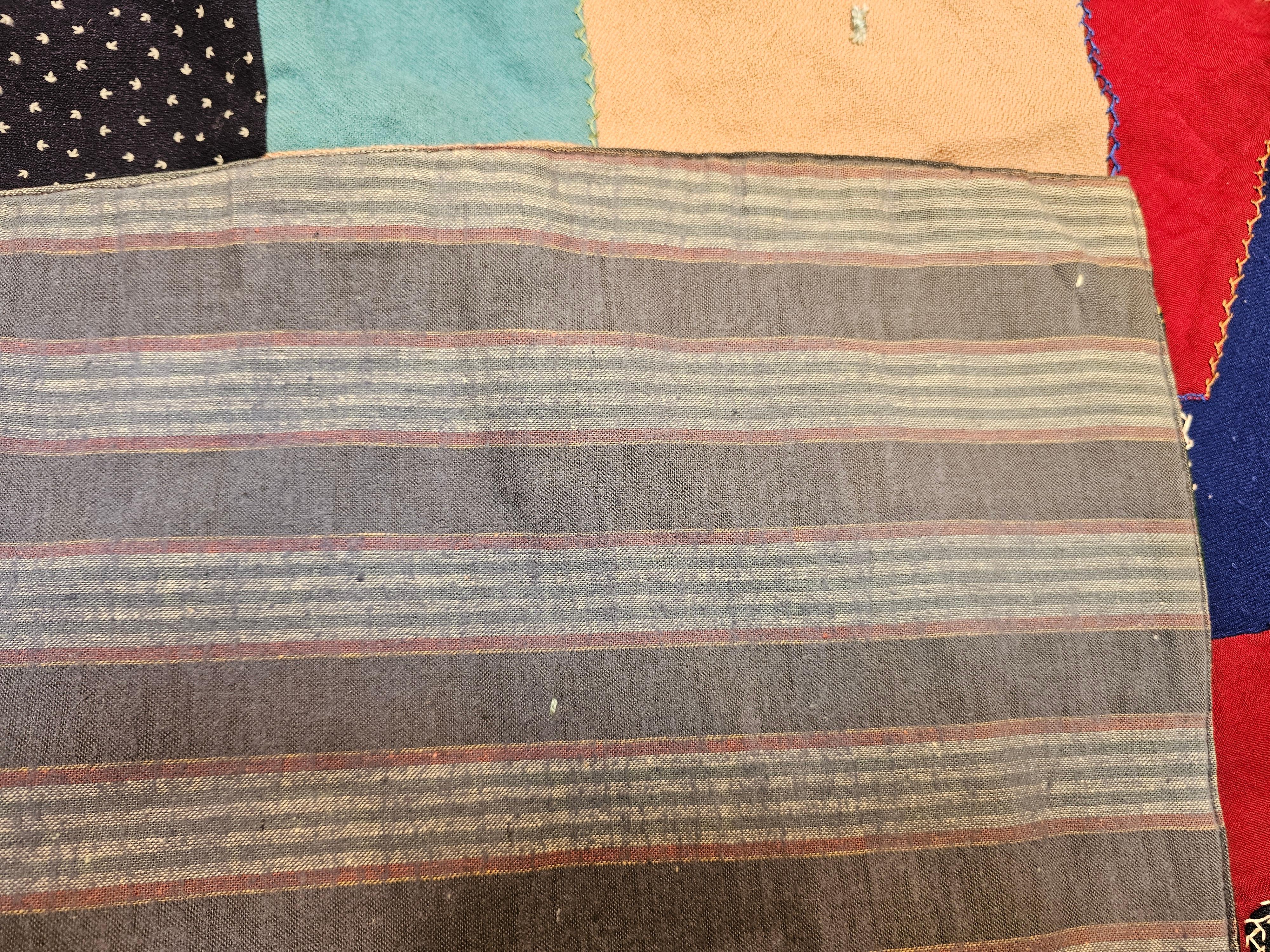 Early 20th Century American Crazy Quilt in Turquoise, Pink, Yellow, Navy, Green For Sale 7