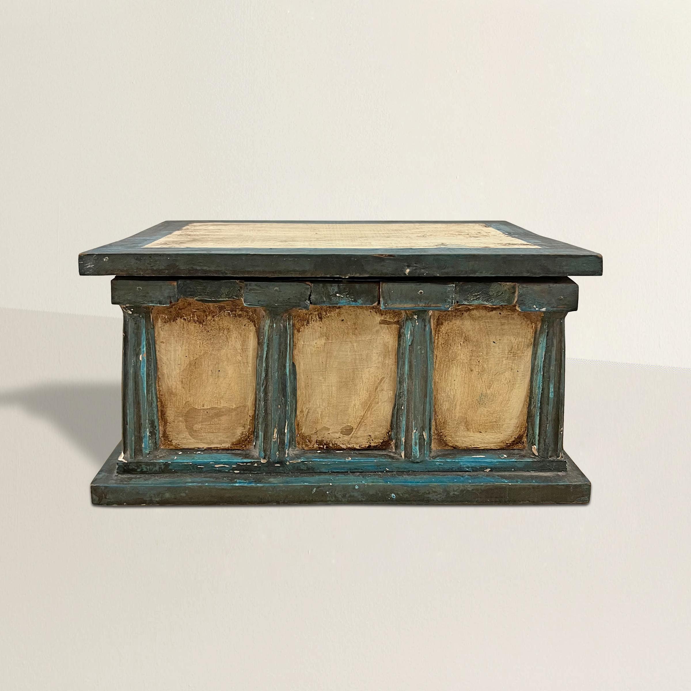 A fascinating and truly unique early 20th century American Folk Art box with the most wonderful Greek temple design with eight blue painted Doric columns around the perimeter and with a hinged lid.  Perfect on a bookshelf, coffee table, or hidden in