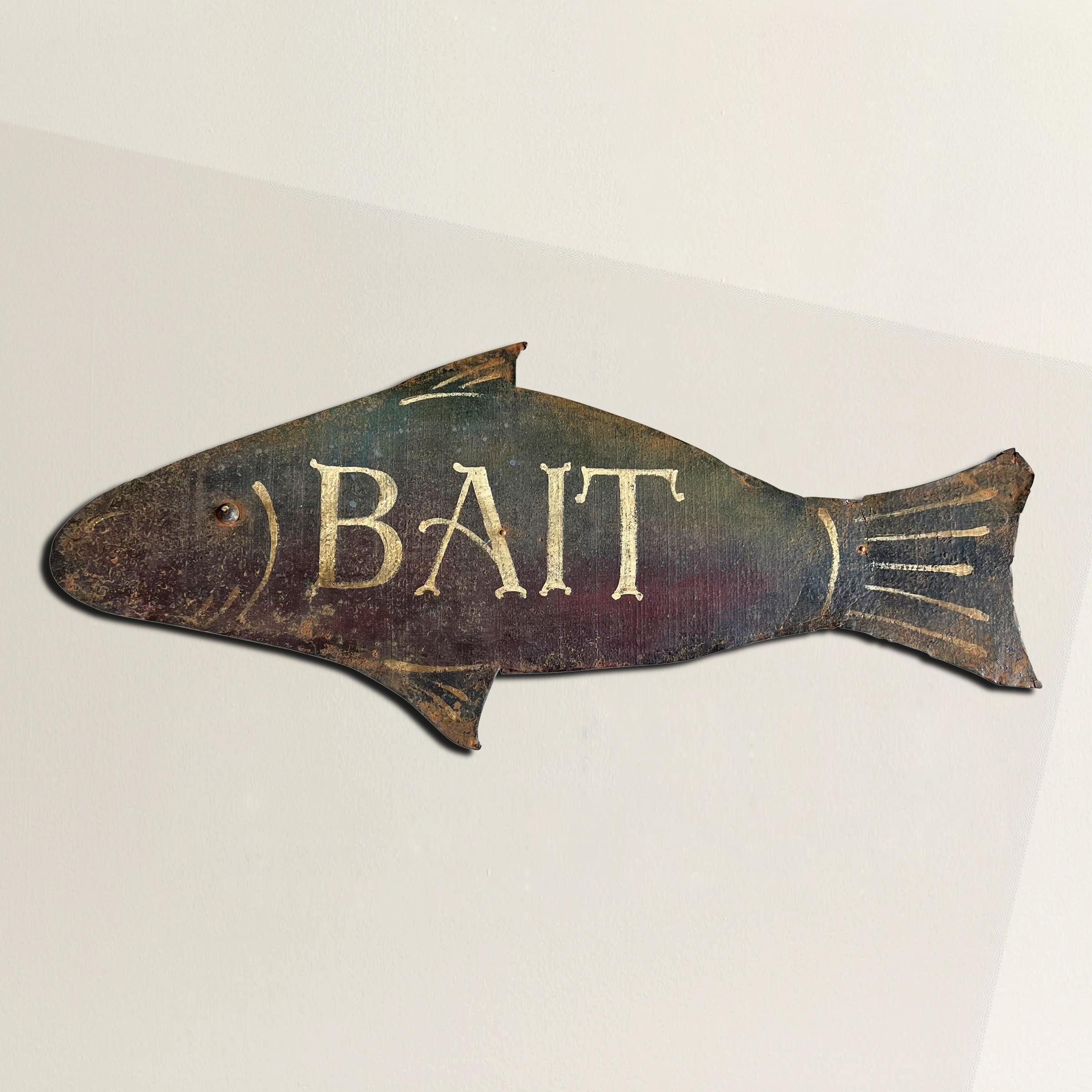 Experience a true treasure of American folk art with this exceptional early 20th-century sheet metal bait shop sign, expertly crafted in the shape of a rainbow trout. Originally created for a bait shop nestled in the scenic landscapes of northern