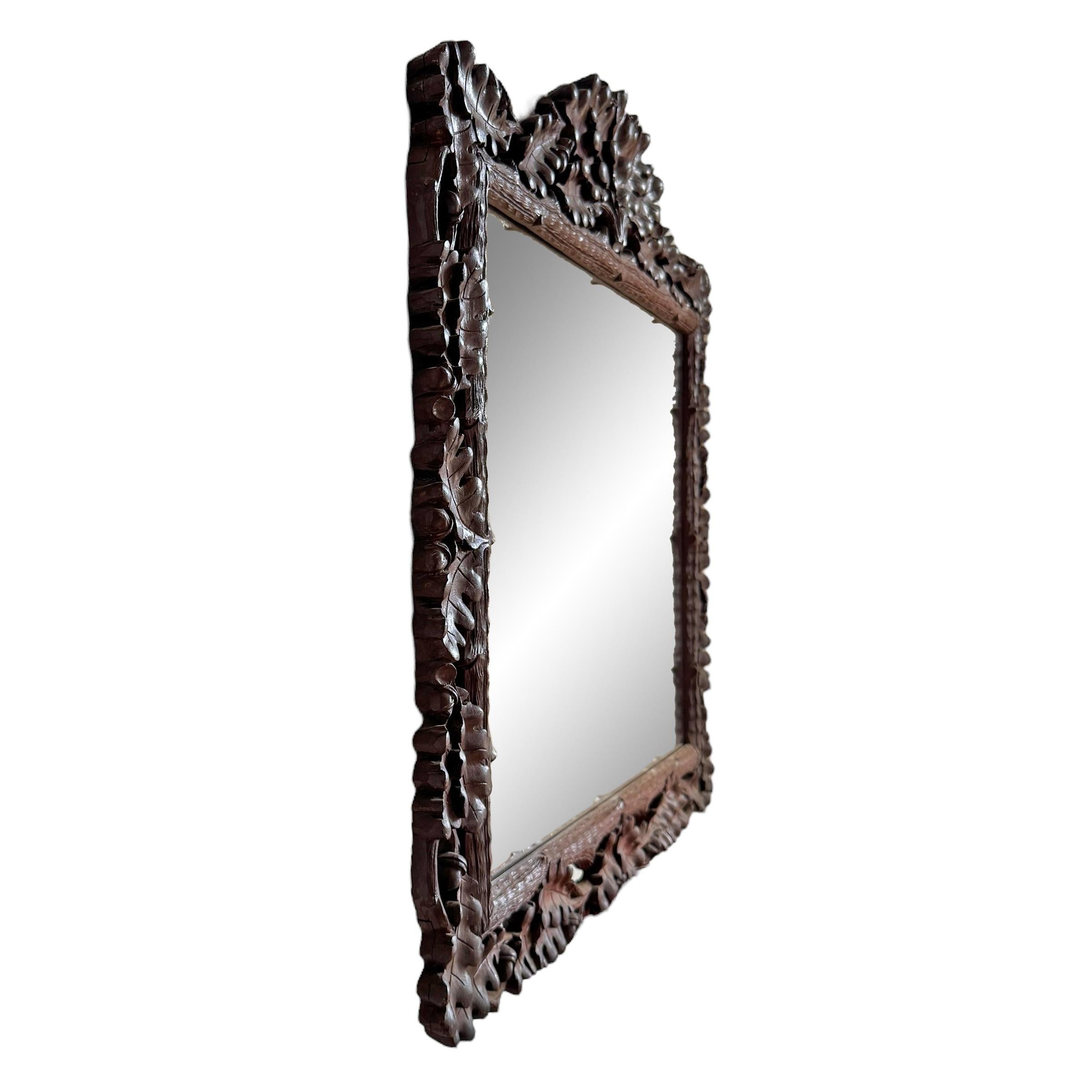 Hand-Carved Early 20th Century Black Forest Oak Leaf Framed Mirror