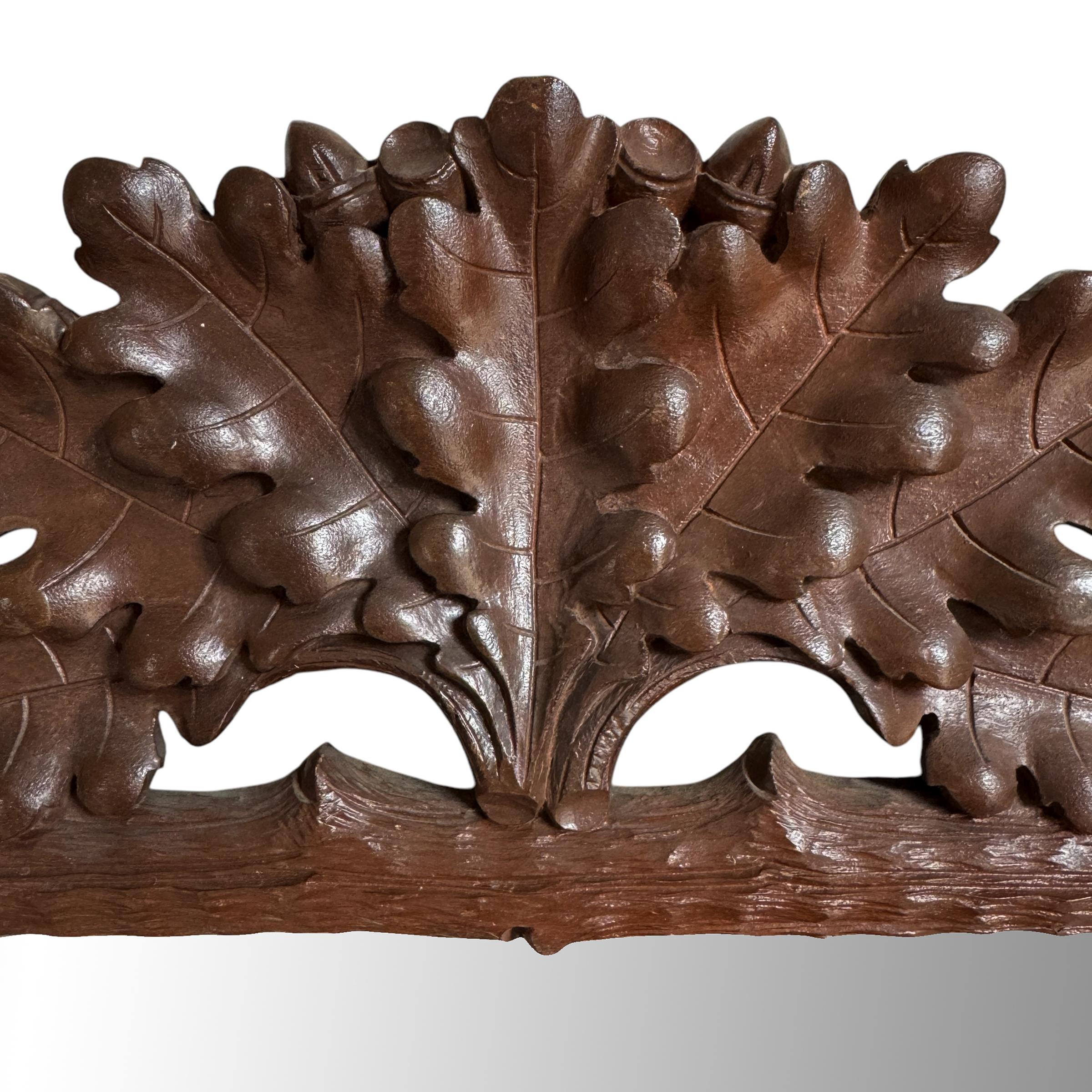 Early 20th Century Black Forest Oak Leaf Framed Mirror In Good Condition In Chicago, IL