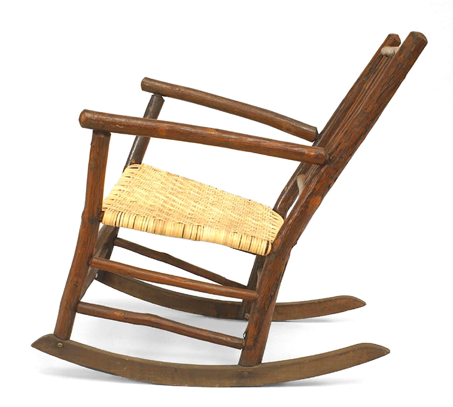American Rustic Old Hickory rocking chair with spindle back design and (new) woven seat
