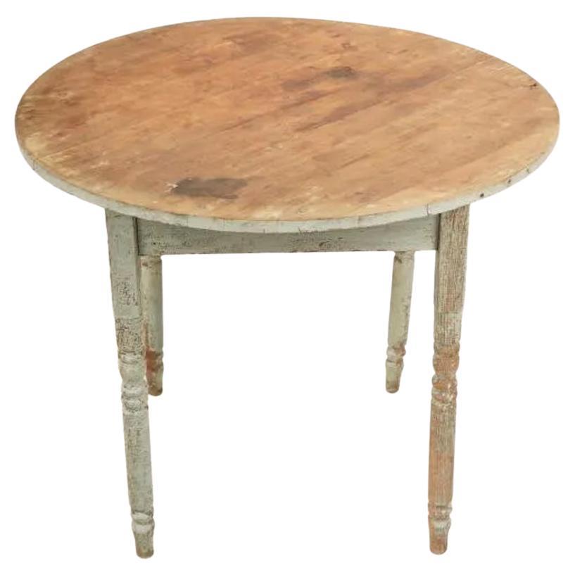 Early 20th Century American Rustic Painted Round Top Table Over Turned Legs For Sale