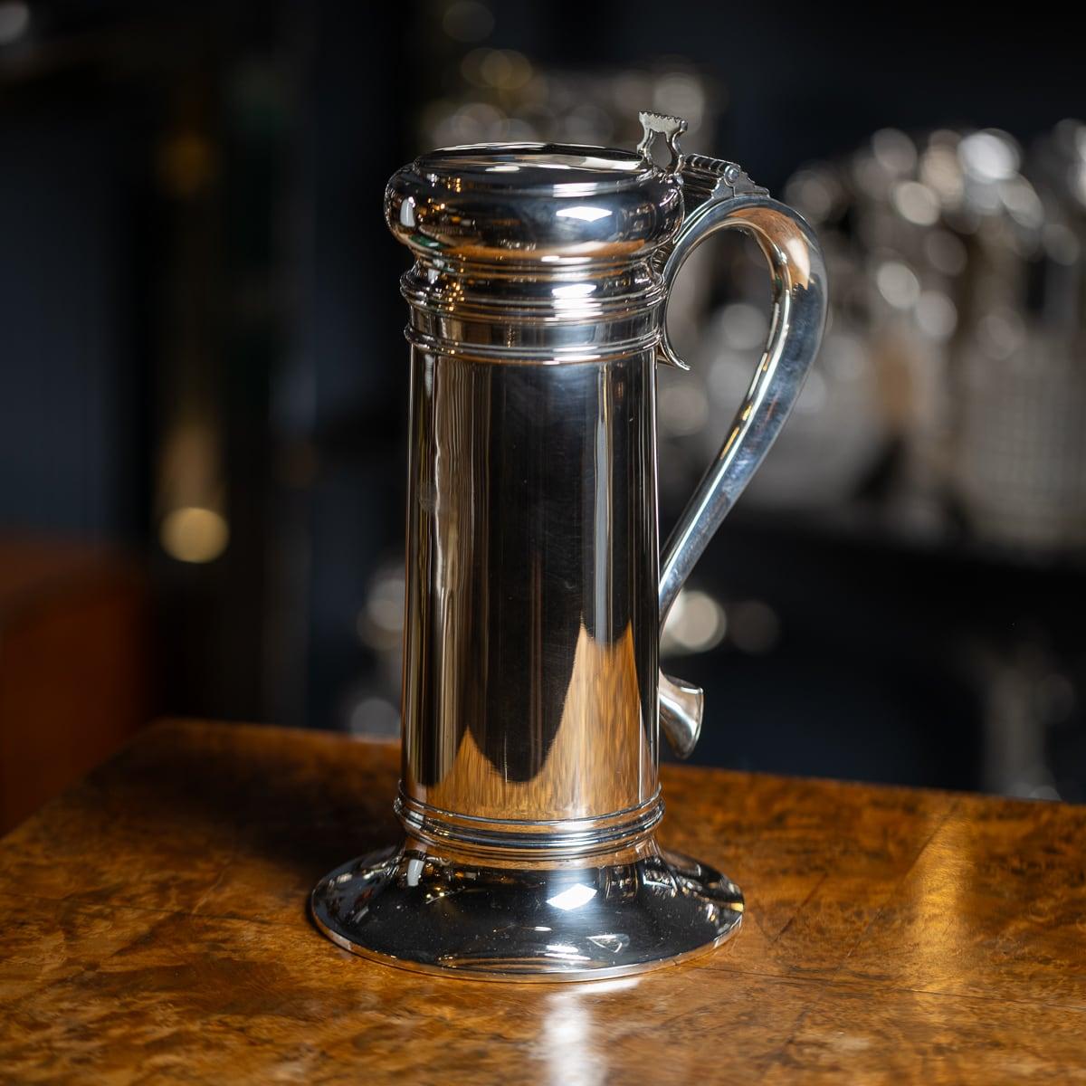 Antique early 20th Century American made novelty cocktail shaker in the shape of a large beer tankard. It is of a large size, being able to hold two pints. It is easy to imagine the appeal behind these objects which would have made wonderful items