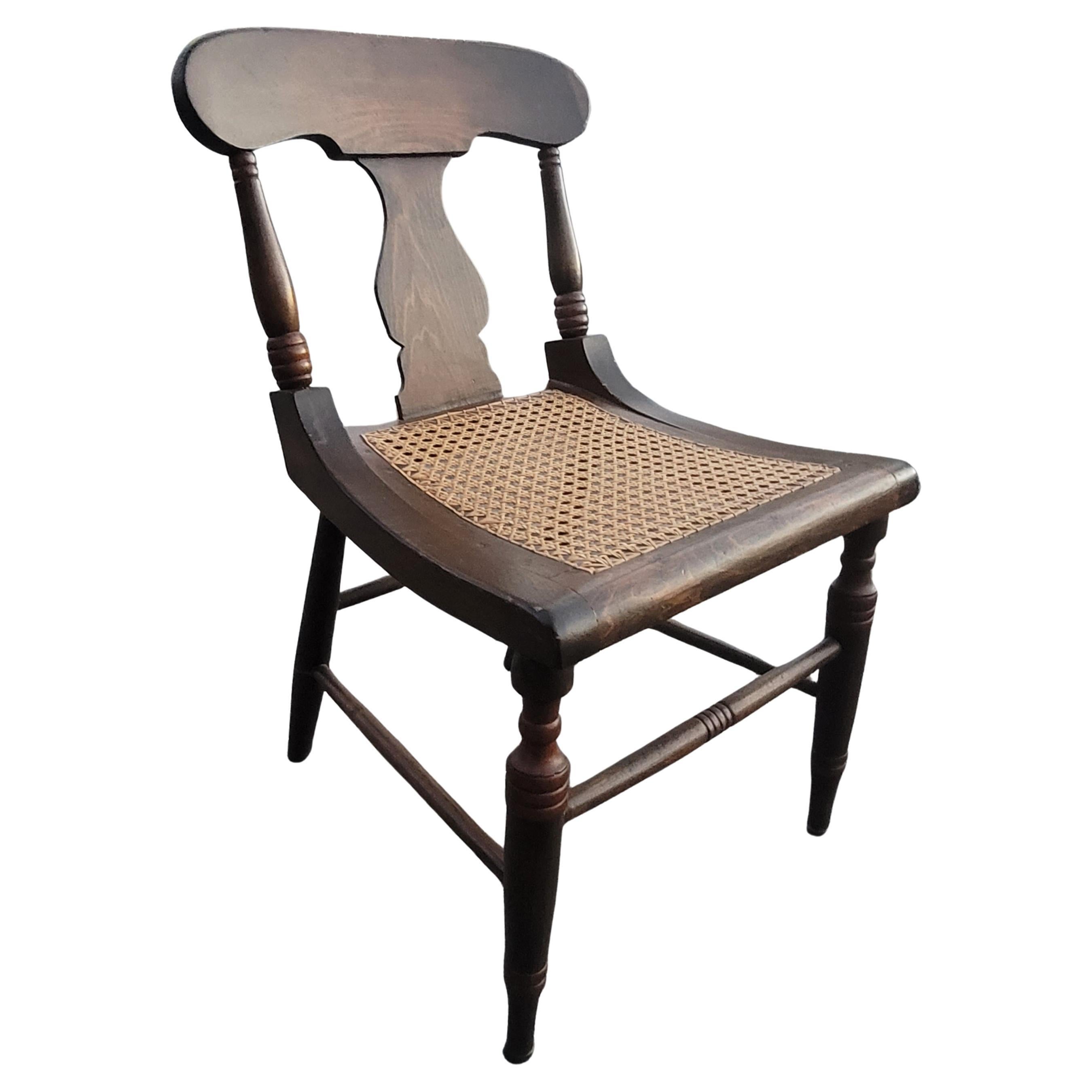 Early 20th century American Victorian Cane Seat Side Chair. Newer caning and good condition. Measures 18