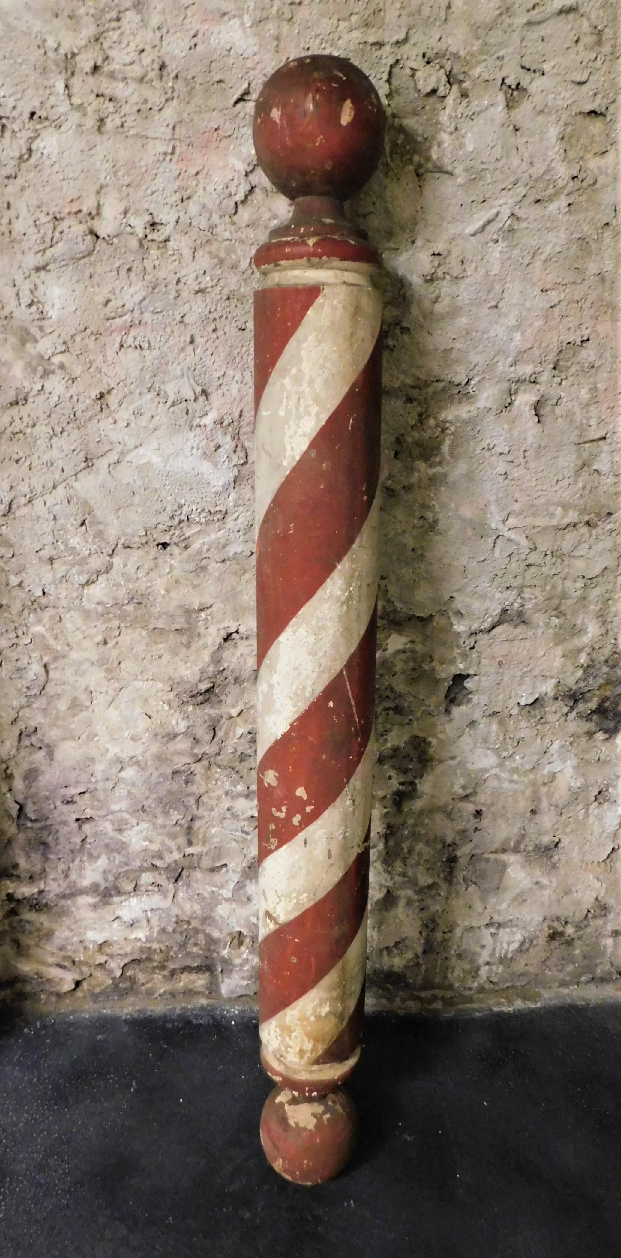 U.S.A. wood barbers pole. Paint loss consistent with the age of the item, circa 1900.