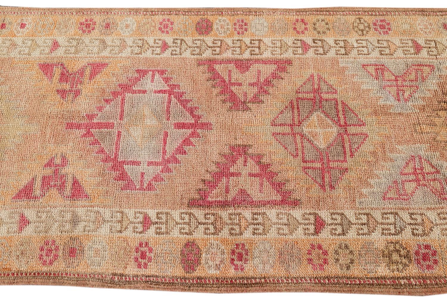 Hand-Knotted Anatolian Village Handmade Tribal Motif Peach Runner Rug For Sale