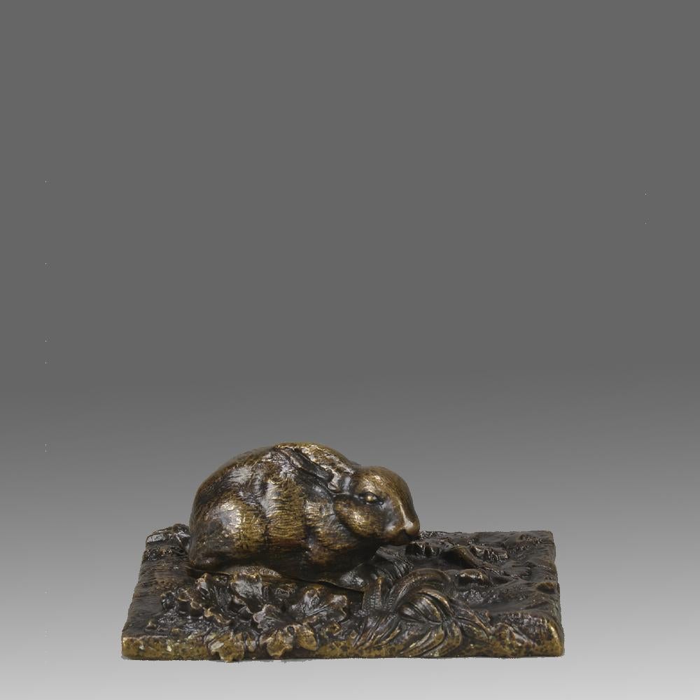 An endearing French bronze study of a timid rabbit grazing in a pasture with excellent hand chased surface detail and attractive brown and golden patina, unsigned

ADDITIONAL INFORMATION
Height:                               3.5 cm
Width:           