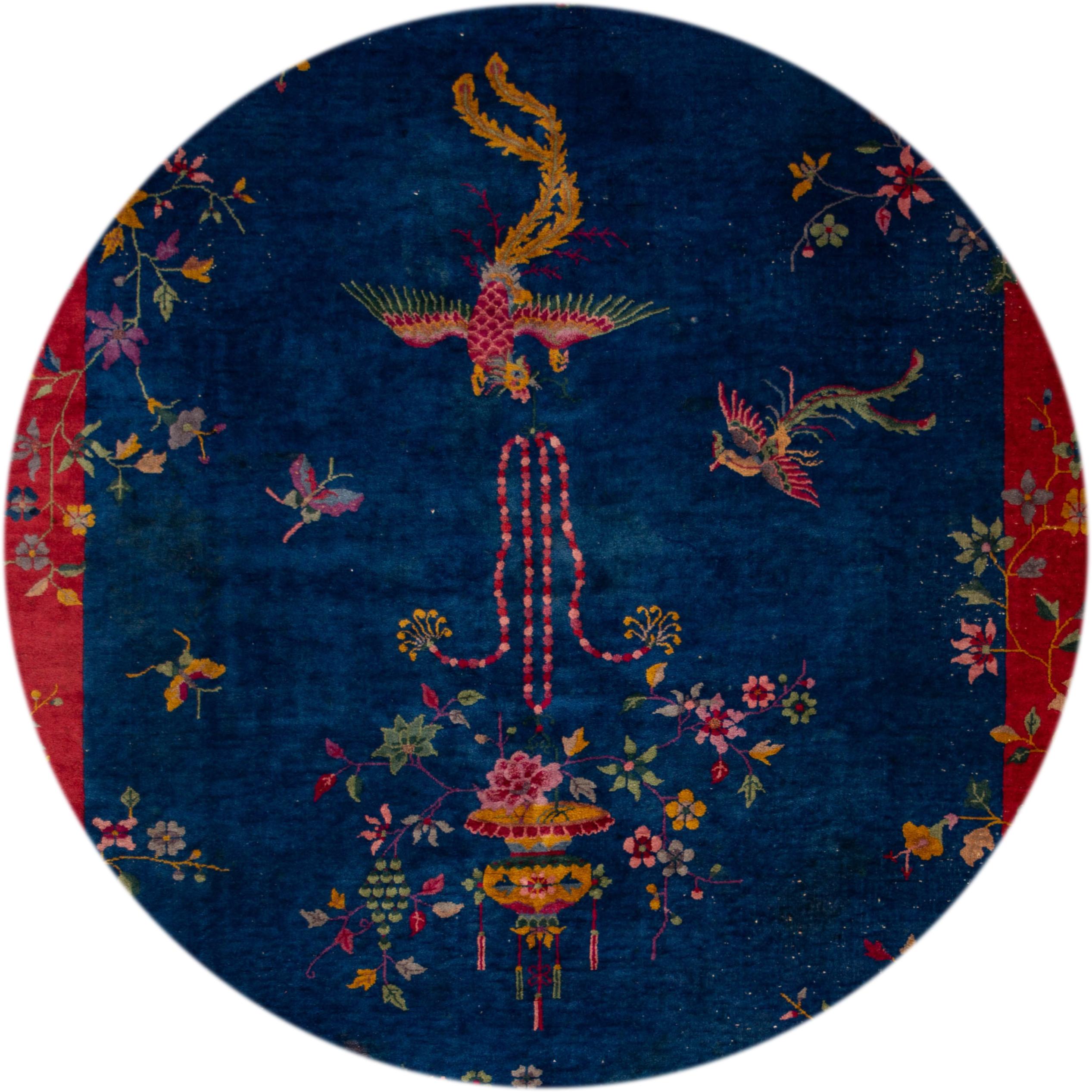 Beautiful antique Art Deco Chinese rug, hand knotted wool with a blue field, red frame in an all-over Classic Chinese motif.
This rug measures 8' 1