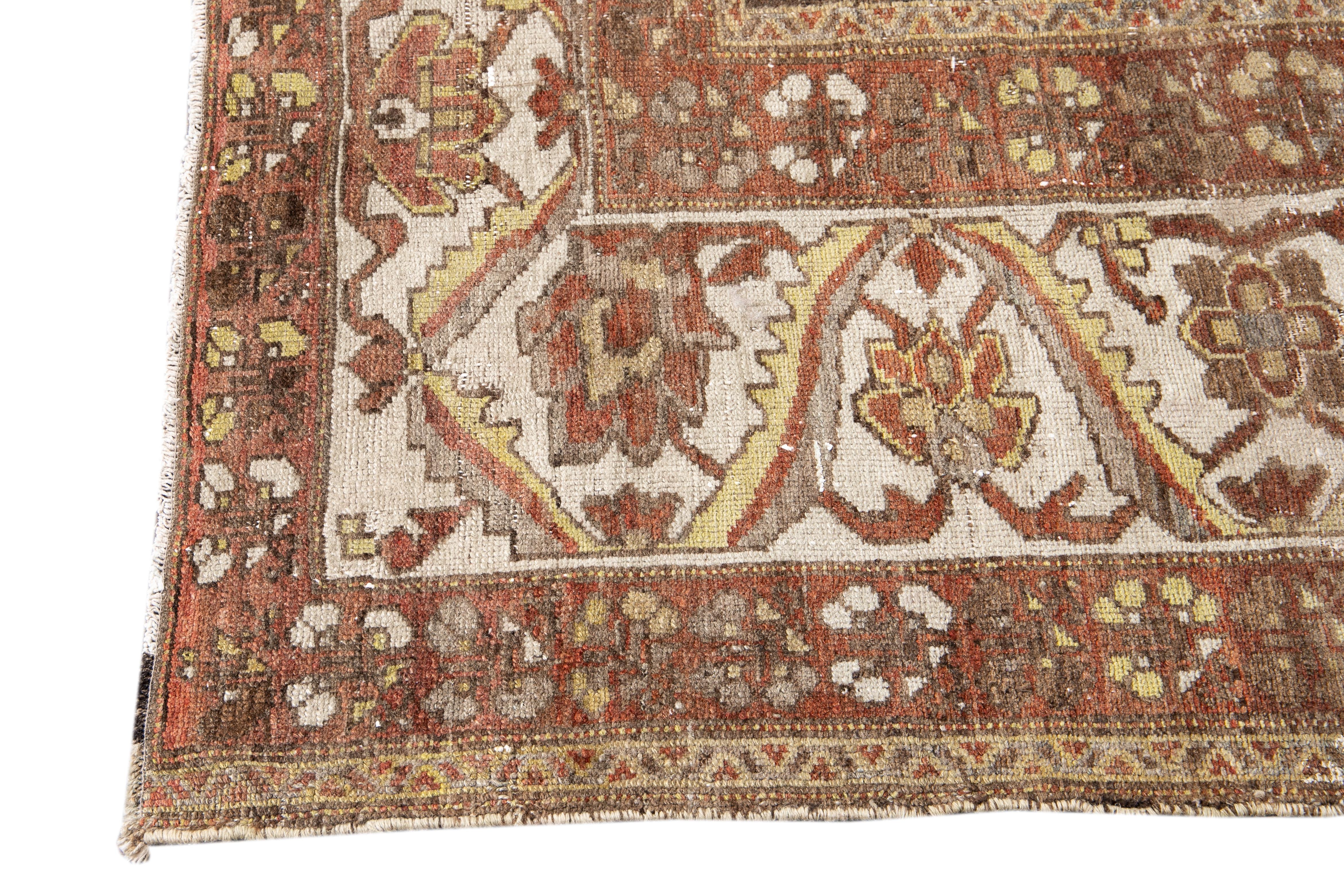 Persian Antique Brown Bakhtiari Handmade Floral Motif Wool Rug For Sale
