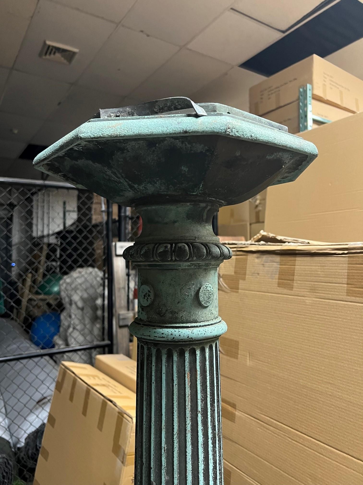 Early 20th Century Antique Bronze Fluted Lamp Post with a Triangular Base. In Good Condition For Sale In Stamford, CT