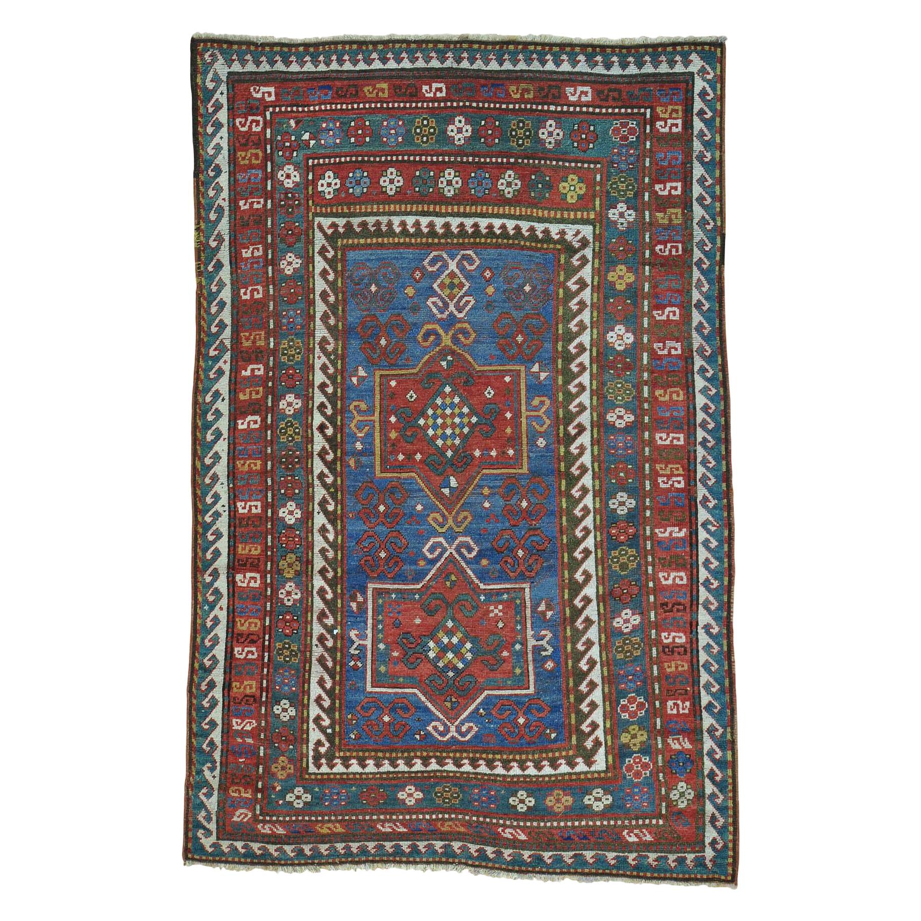 Early 20th Century Antique Caucasian Hand Knotted Rug - 4'8" x 7'2" For Sale
