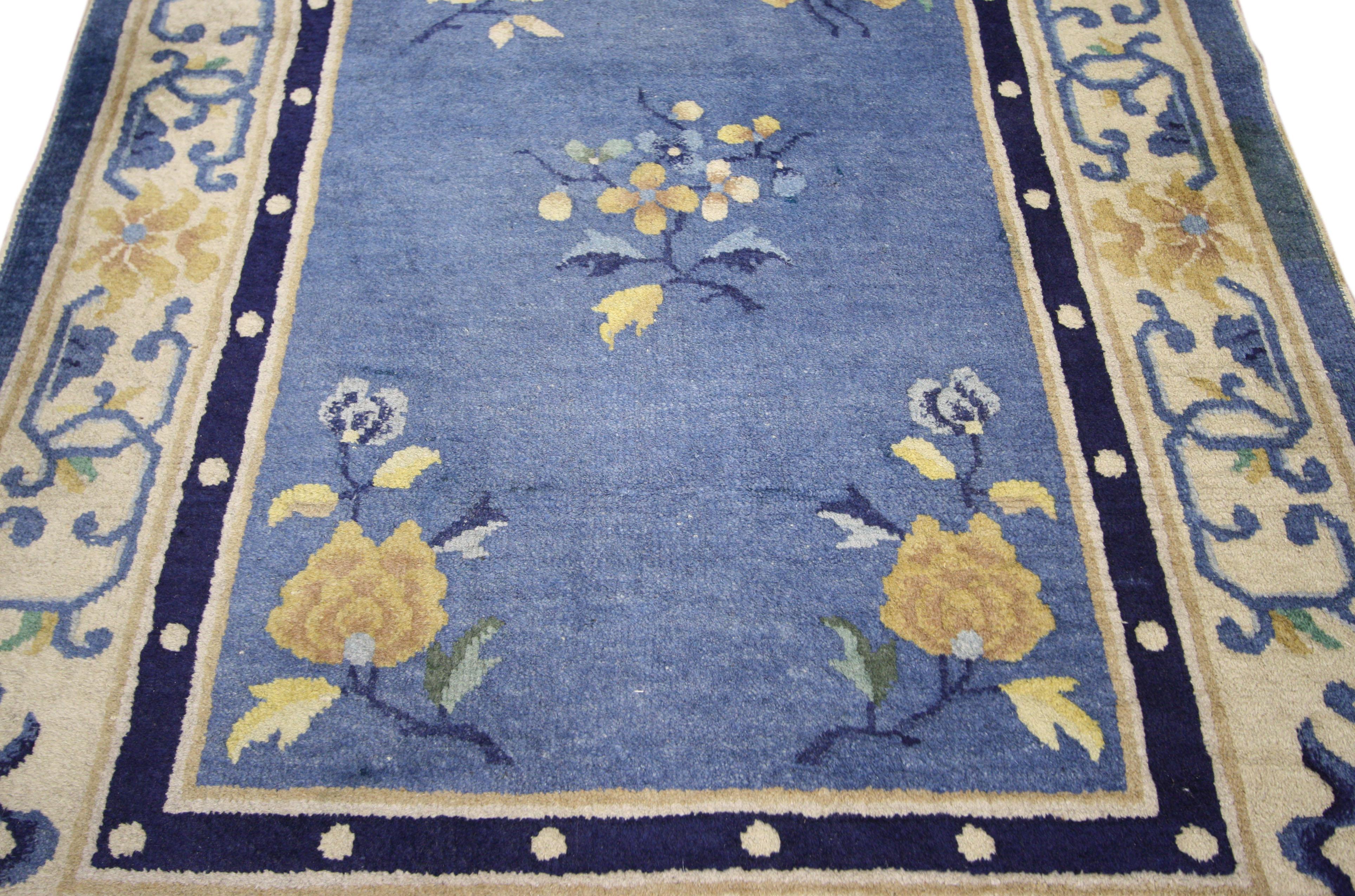 76881 Early 20th Century Antique Chinese Art Deco Hallway Runner. Refresh your space with this 1920s Chinese Art Deco runner, attributed to Walter Nichols. A striking mix of asymmetrical floral pattern and contrasting colors, this Art Deco rug is a