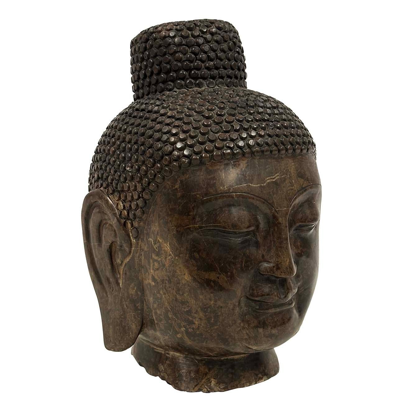 Look at this magnificent Chinese Antique Carved Stone Buddha Head. It was dated back to 1920s and shows very detailed hand carving works on it. You can see from the pictures that It is in many years history with some minor blemishes due to age but