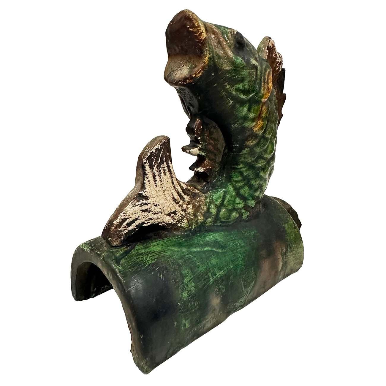 This Vintage Chinese Ceramic roof tile is 100% hand made and hand carved of Chinese traditional Koi fish design. It was used on top edges of building roof. Look at the pictures, there are some old chips and tiny crack hairlines on it, but it still