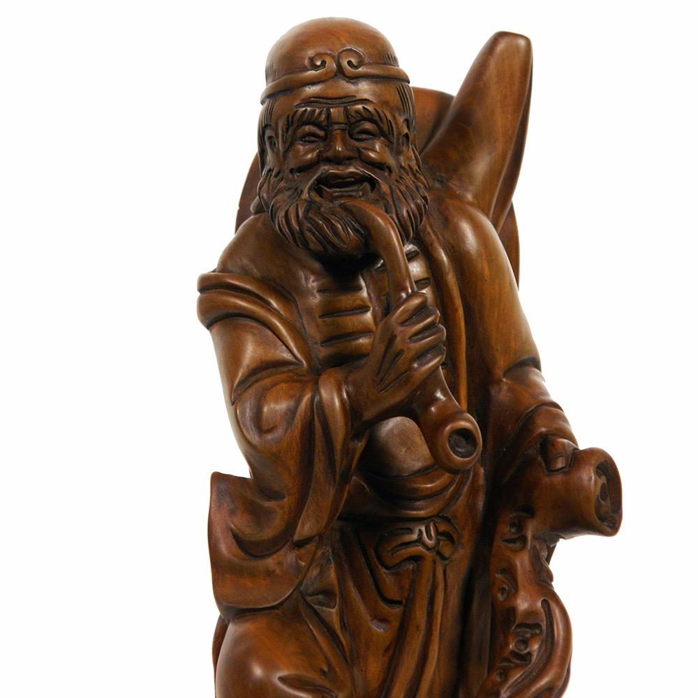 Cette magnifique statuaire chinoise antique de Bouddha en bois sculpté - Dharma est ornée d'un travail de sculpture à la main très détaillé. Il est entièrement fabriqué et sculpté à la main par Dharma à partir de buis. Selon la légende chinoise,