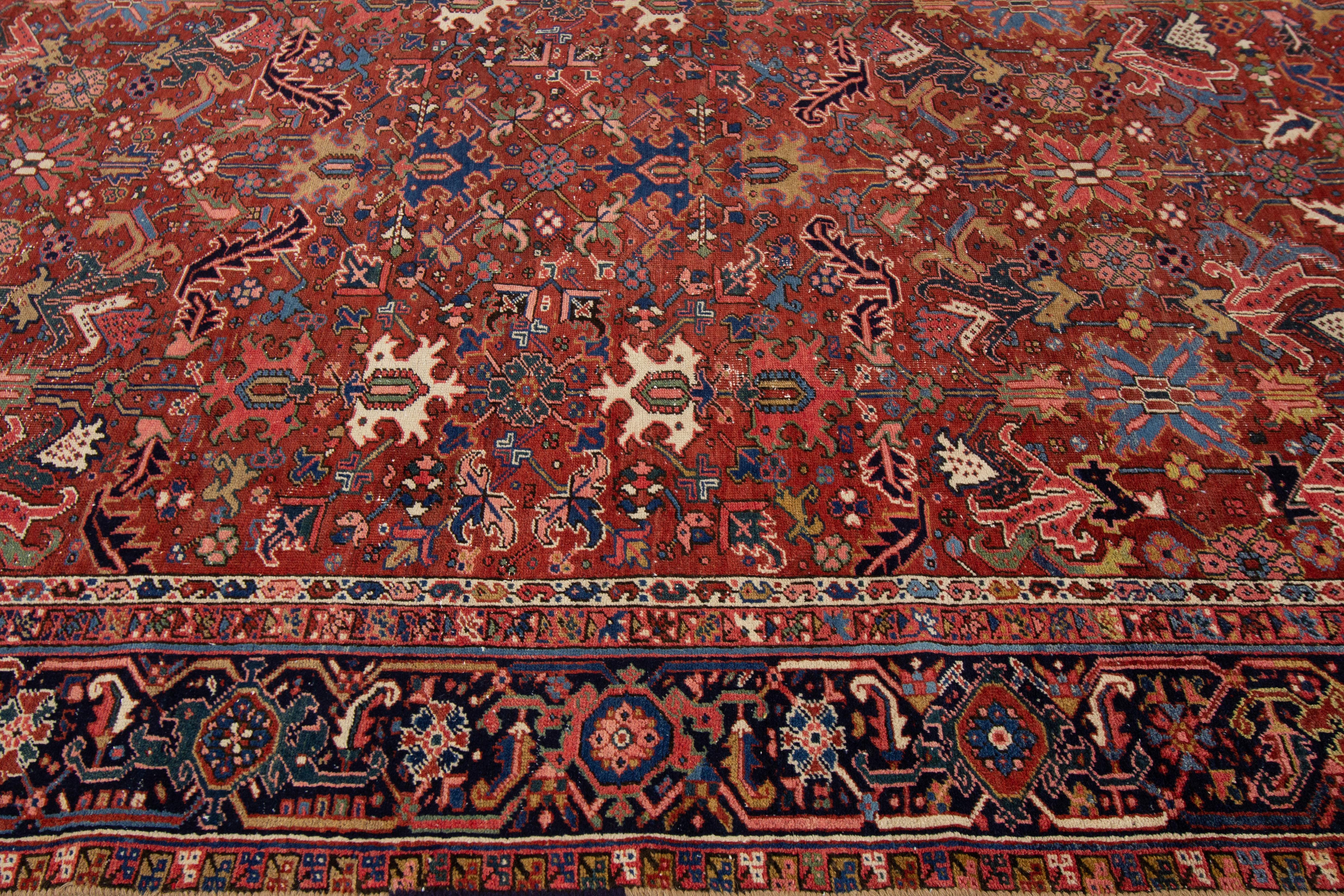 Hand-Knotted Early 20th Century Antique Distressed Persian Heriz Wool Rug For Sale