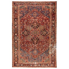 Early 20th Century Antique Distressed Persian Heriz Wool Rug