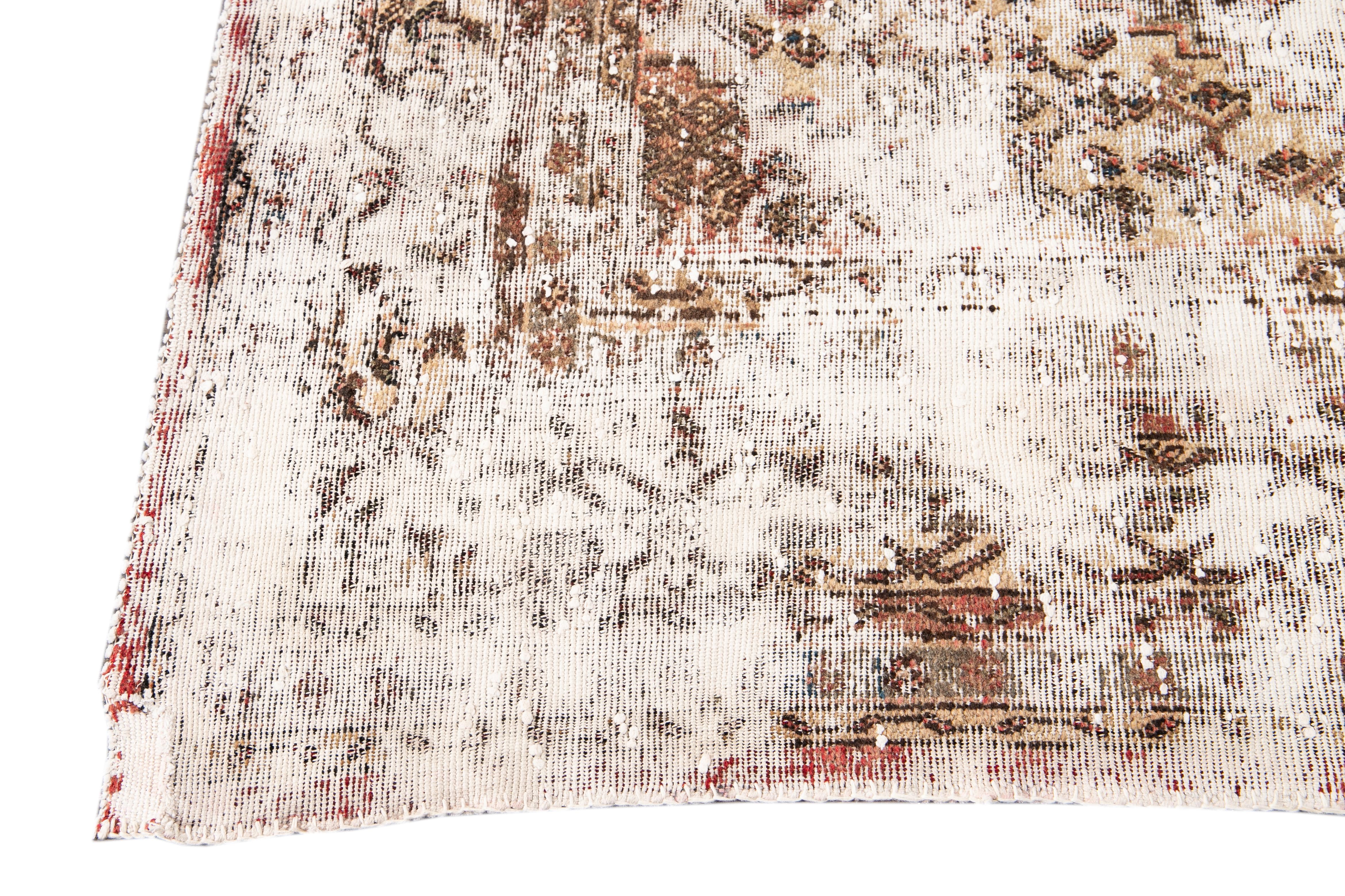 Hand-Knotted Early 20th Century Antique Distressed Wool Rug For Sale