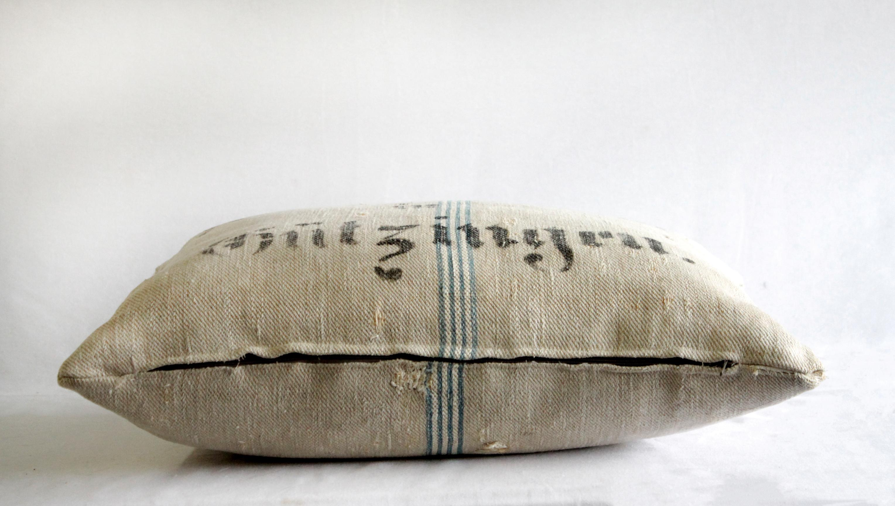 Early 20th century antique European Grainsack pillow with lettering
Natural flax linen background with white and blue stripes, and original stenciled monograming front.
Hidden zipper closure.
Down insert is included.
Measures:
16