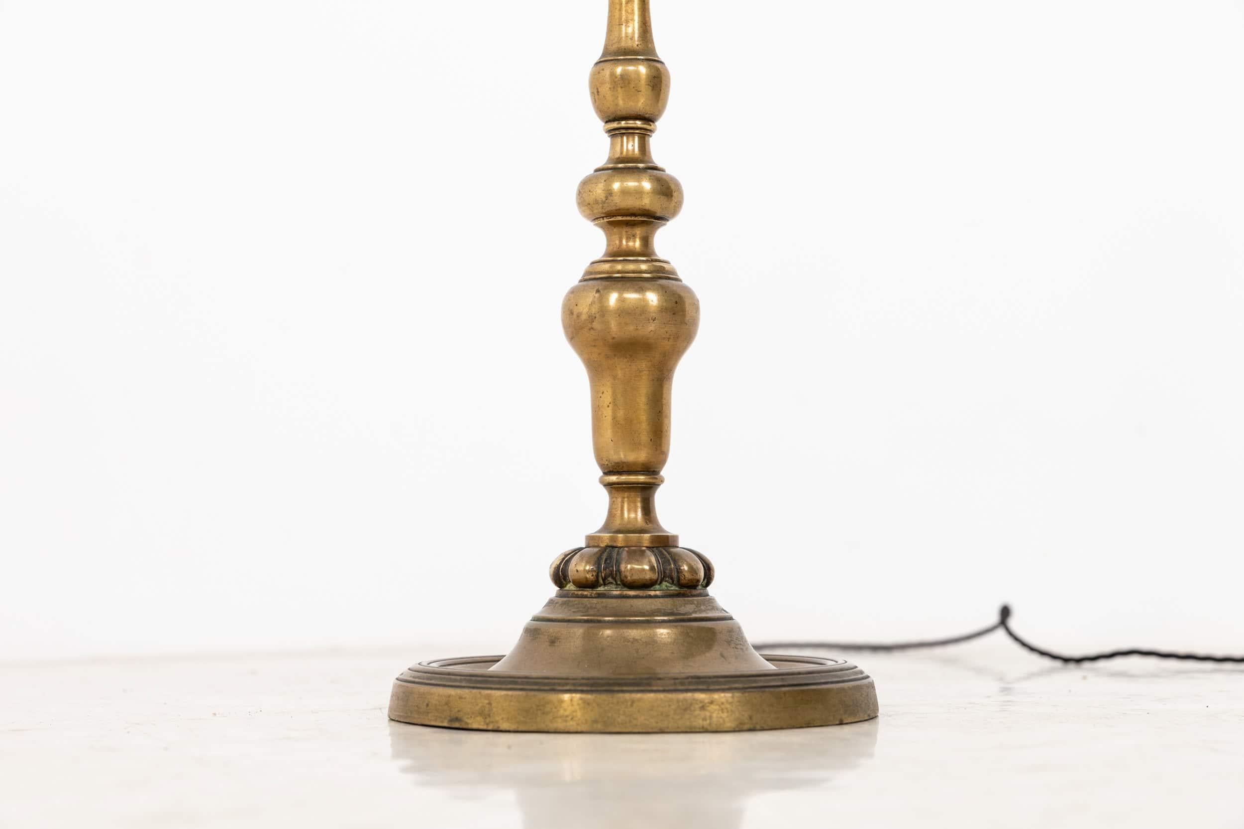 

An elegantly formed cast brass table lamp made in England by GEC. c.1920

Very high quality table lamp, in original condition with nice patina to the brass.

Rewired with 2m of black twisted flex and BS 3-pin plug.

