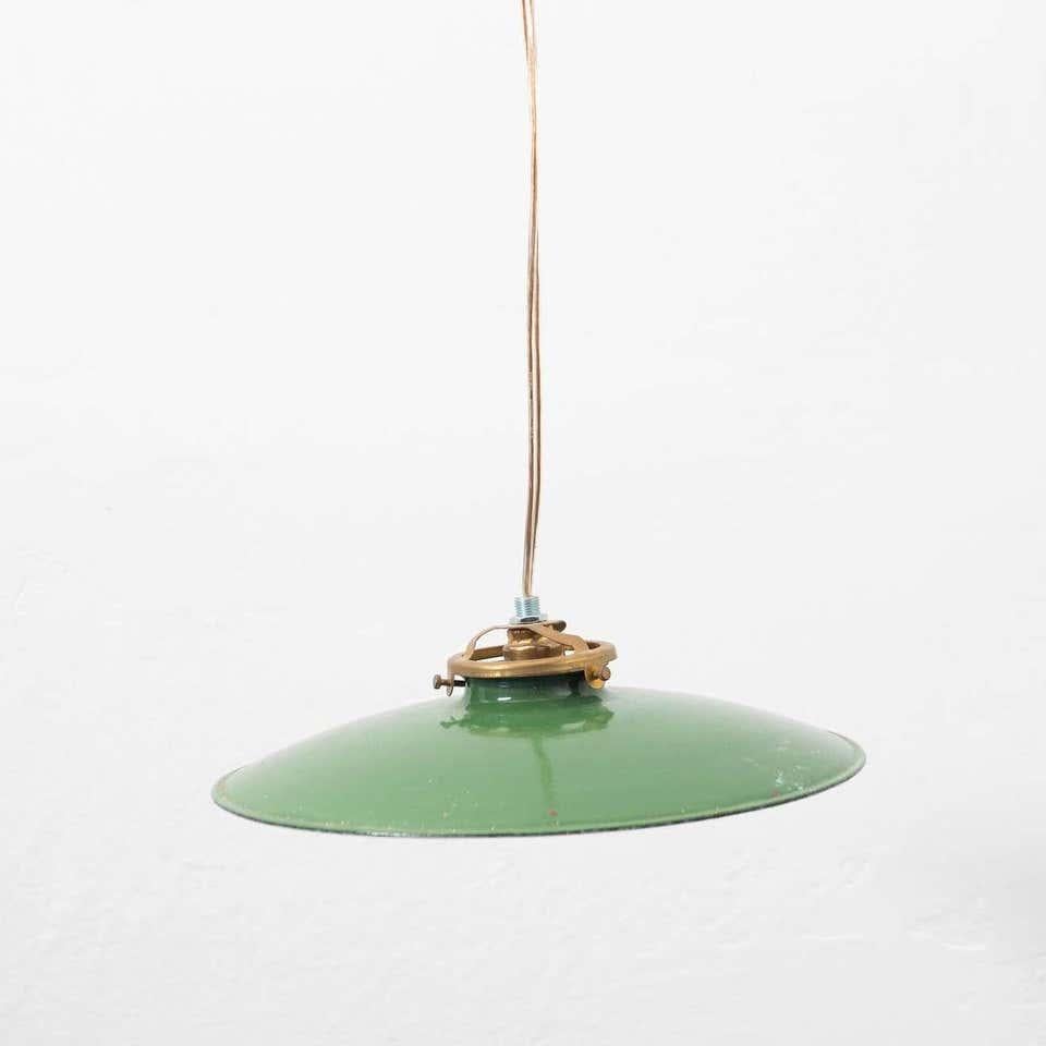Early 20th century antique green lacquered metal ceiling lamp.
By unknown manufacturer, France.

In original condition, with minor wear consistent with age and use, preserving a beautiful patina.

Materials:
Lacquered metal

Dimensions:
Ø 24 cm x H