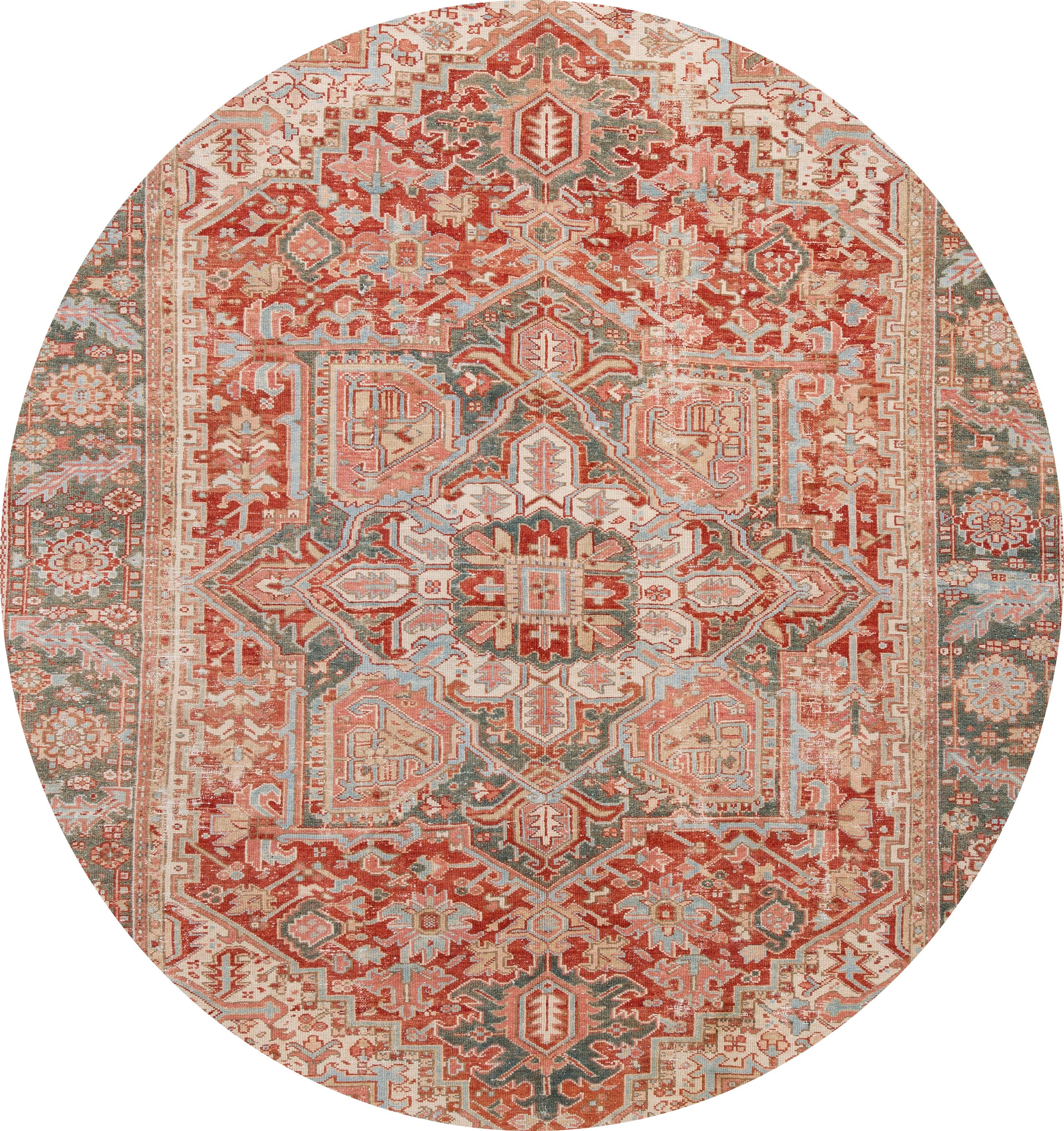 Beautiful antique Heriz rug, hand knotted wool with an ivory field, red and gray accents in all-over center medallion design.
This rug measures 8' 2