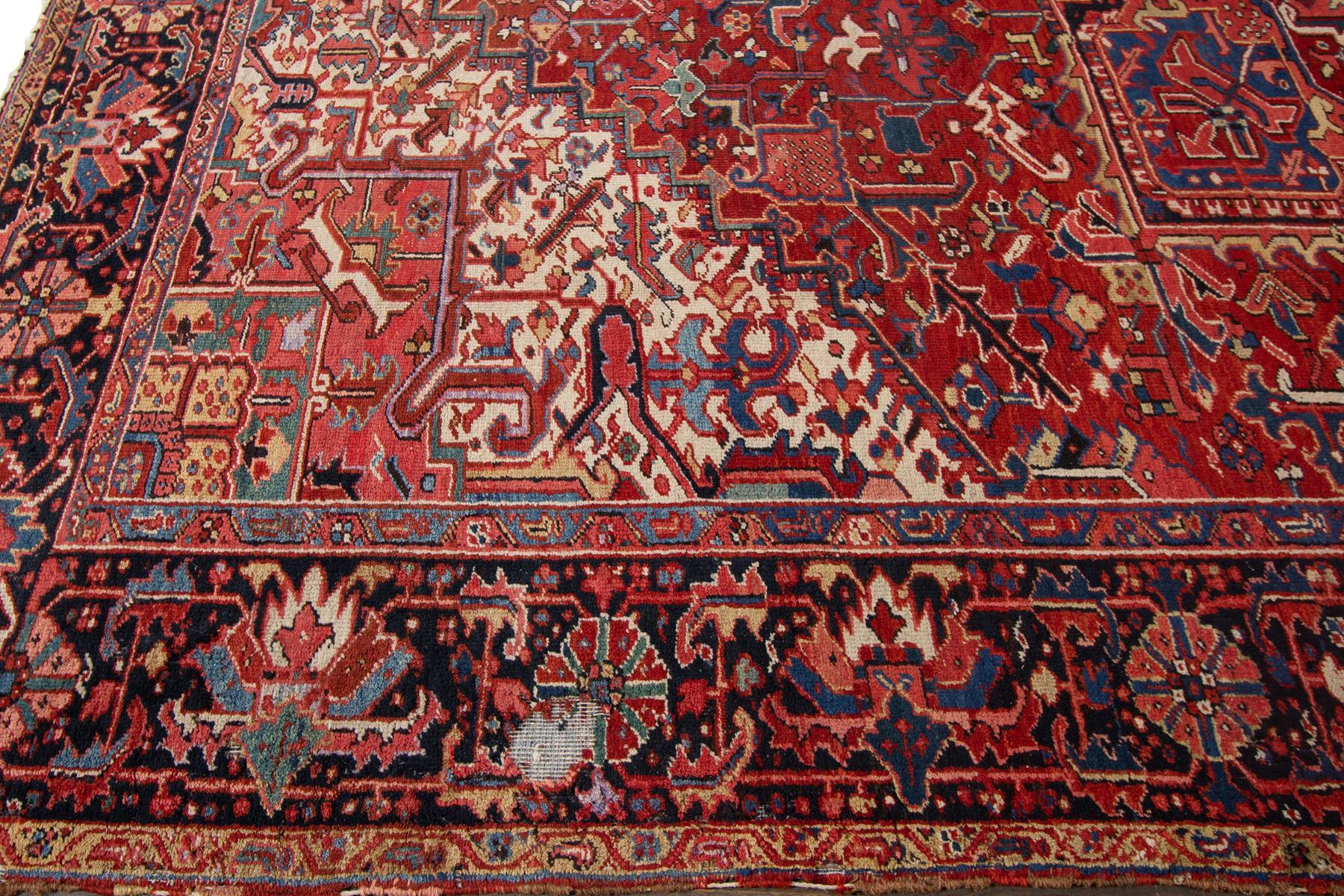 Hand-Knotted 20th Century Antique Heriz Handmade Red Medallion Wool Rug For Sale
