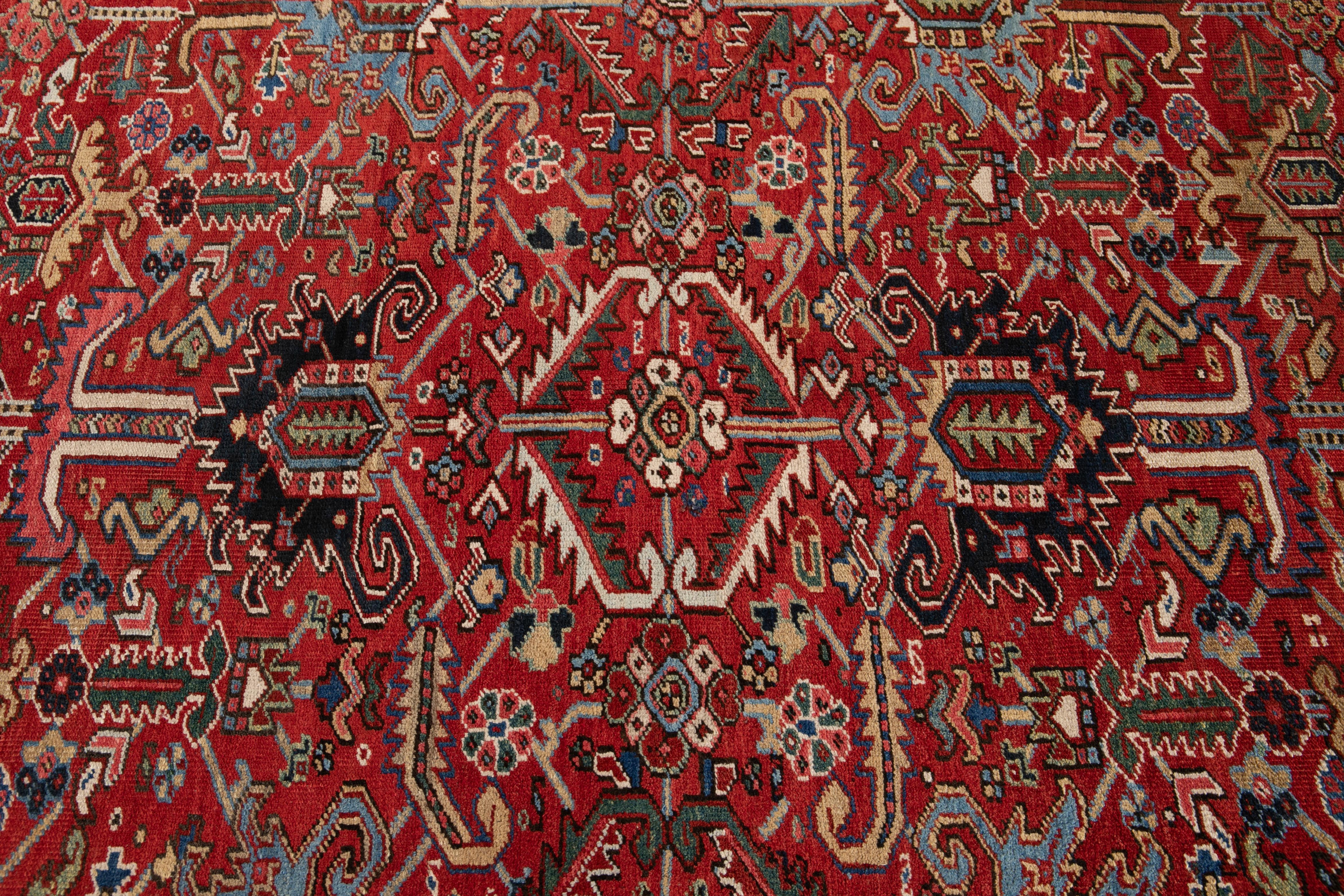 Antique Heriz Handmade Floral Red Wool Rug For Sale 4