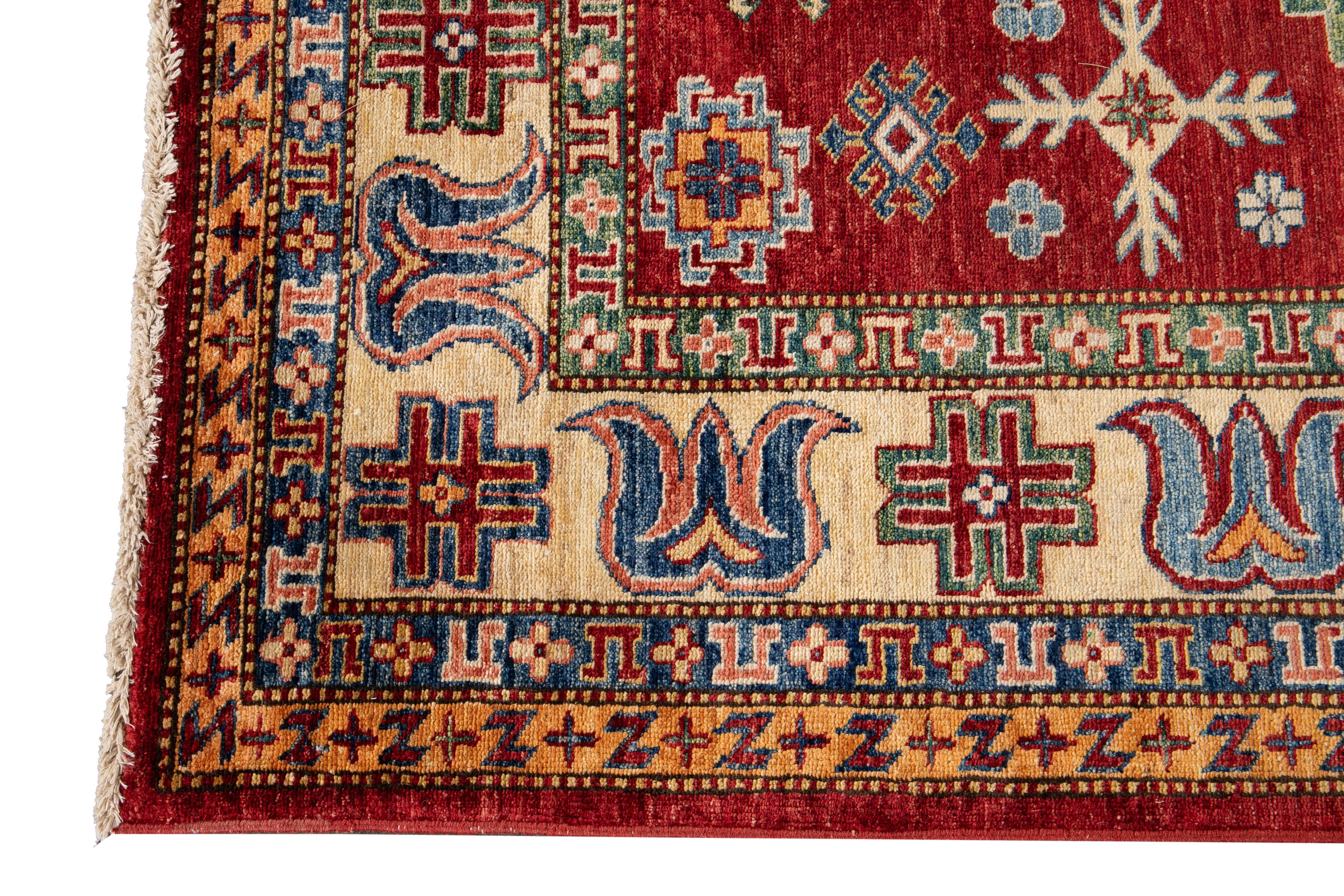 Asian Early 20th Century Antique Kazak Wool Rug For Sale