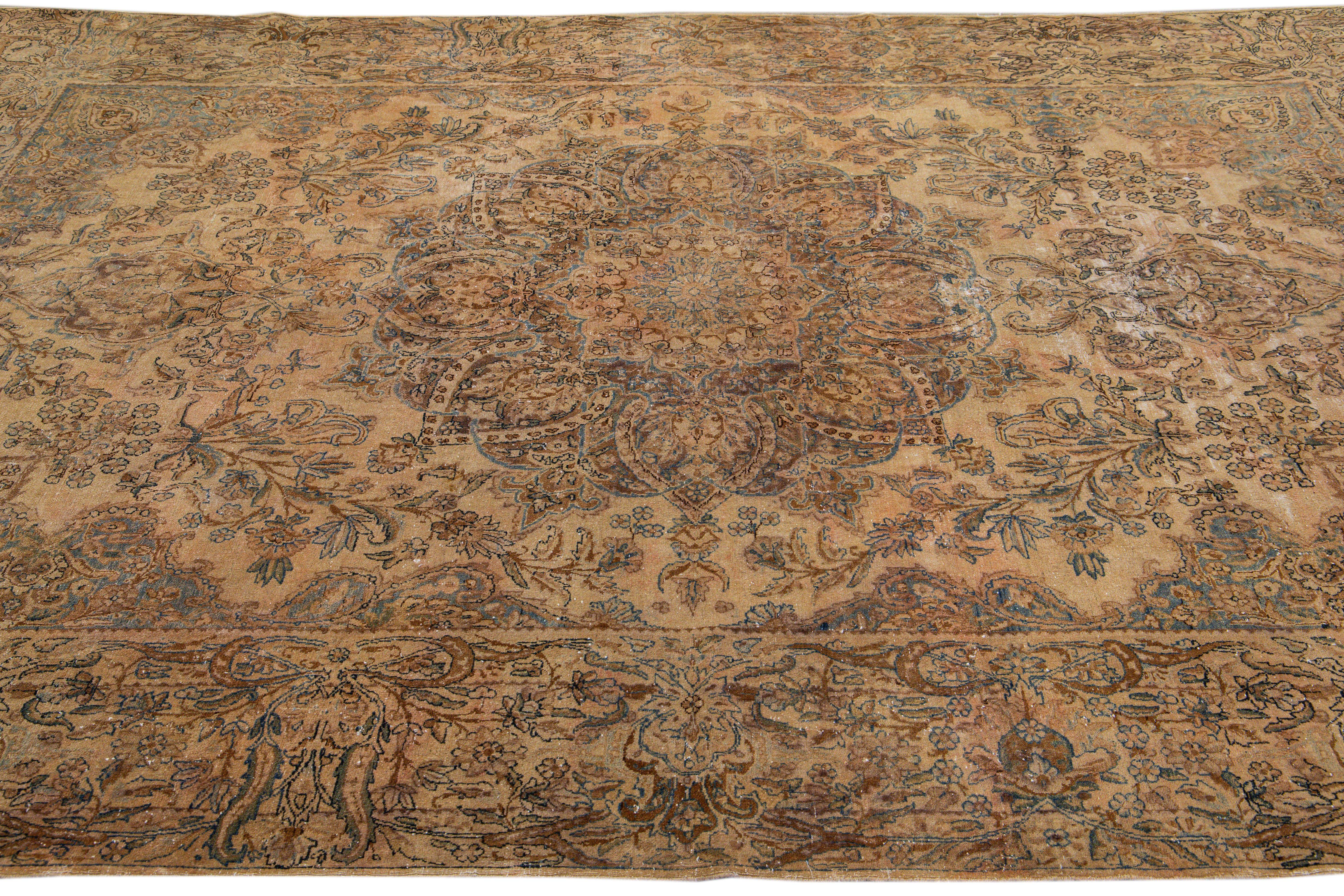 Antique Kerman Handmade Medallion Tan Wool Rug In Distressed Condition For Sale In Norwalk, CT