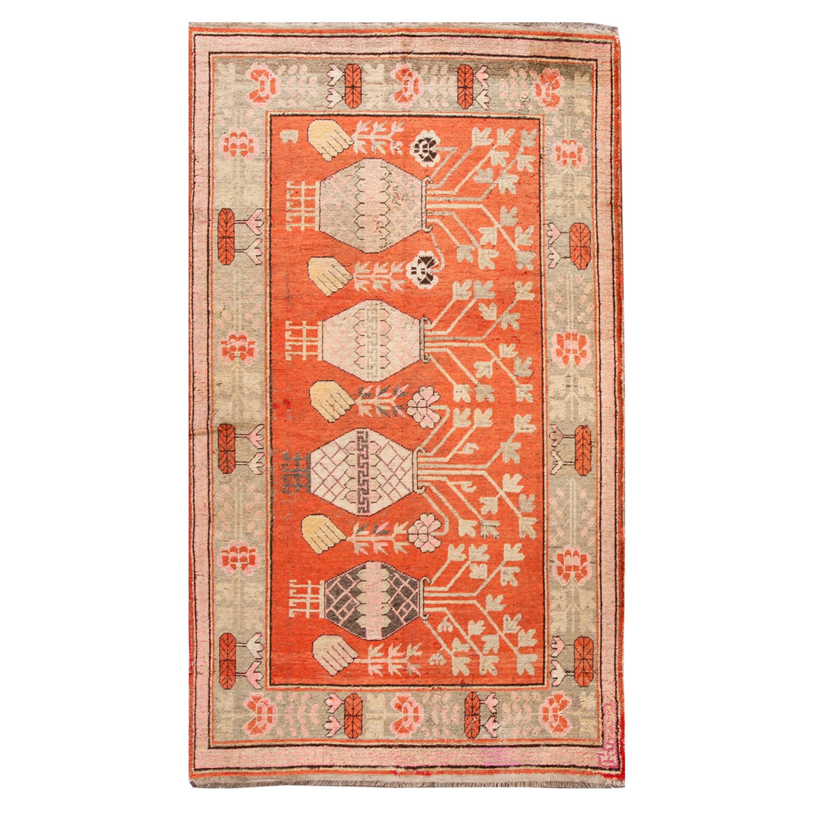 Tapis de laine Khotan ancien du début du 20e siècle:: à motifs dispersés