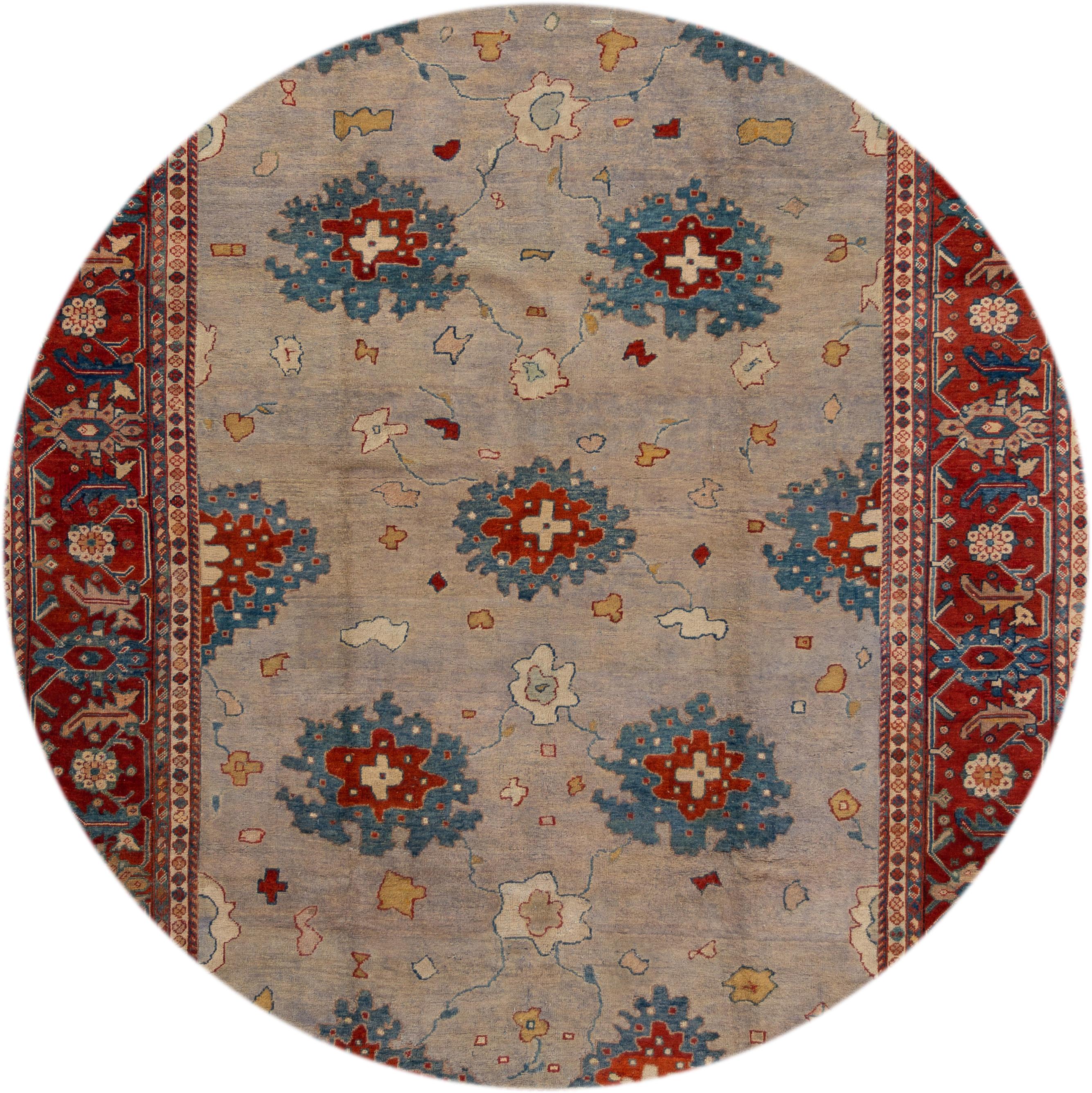 Beautiful antique Persian Mahal rug, hand knotted wool with a gray field, red and blue accents in an all-over Classic motif,
circa 1925.
This rug measures 9' x 11'.