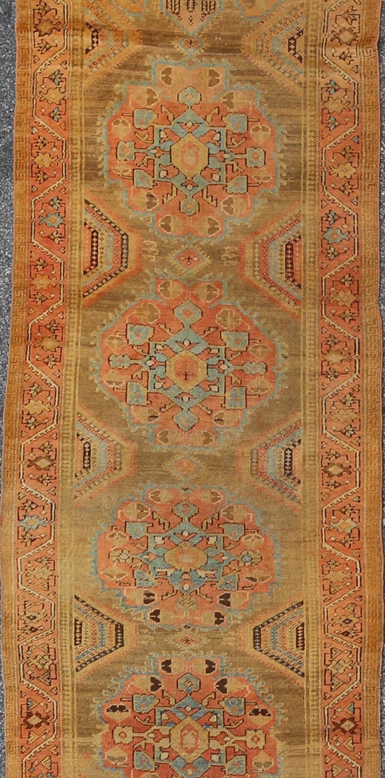 Hand-Knotted Early 20th Century Antique Oushak Runner with Medallions in Sand, Pink and Blue For Sale