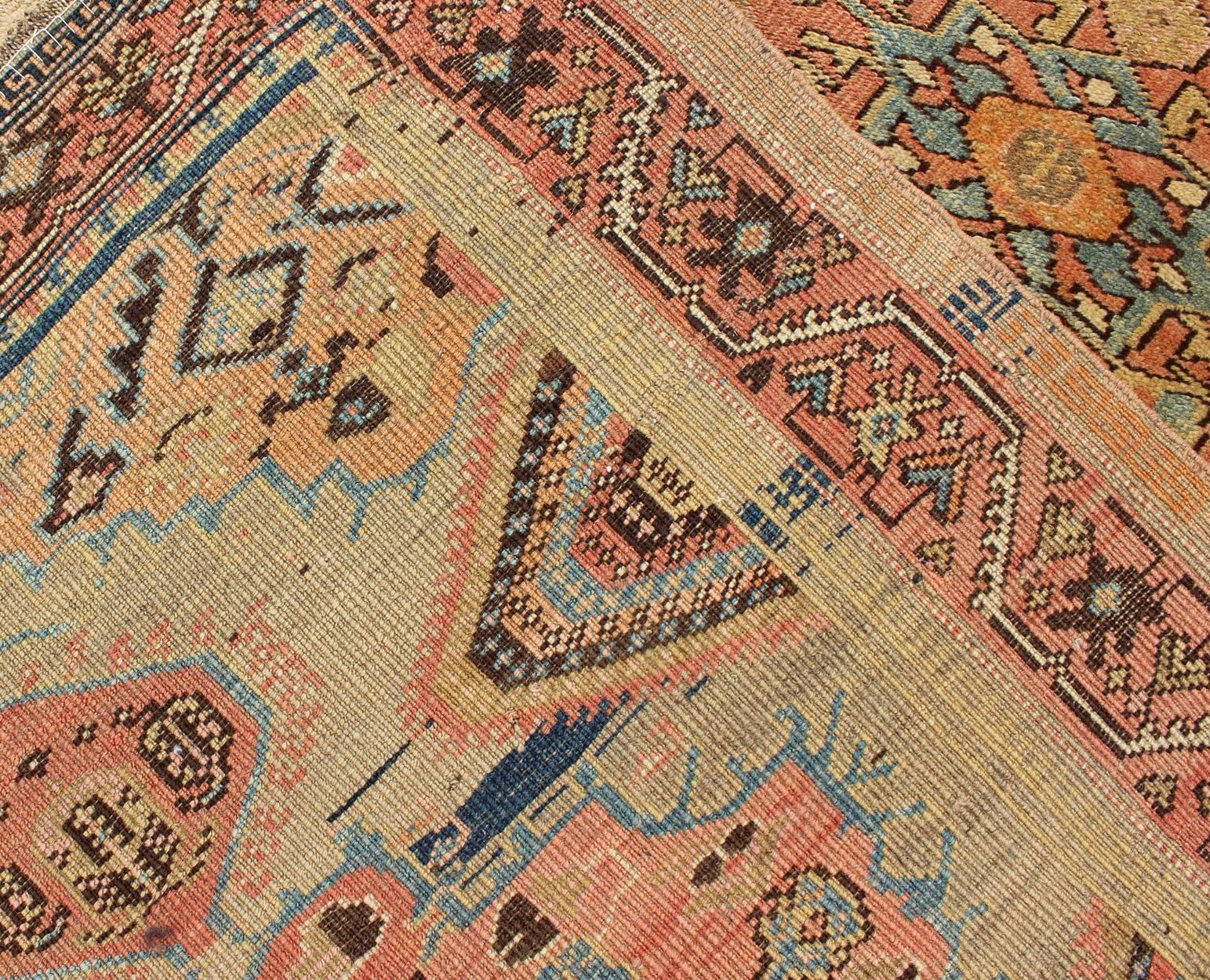 Early 20th Century Antique Oushak Runner with Medallions in Sand, Pink and Blue For Sale 1