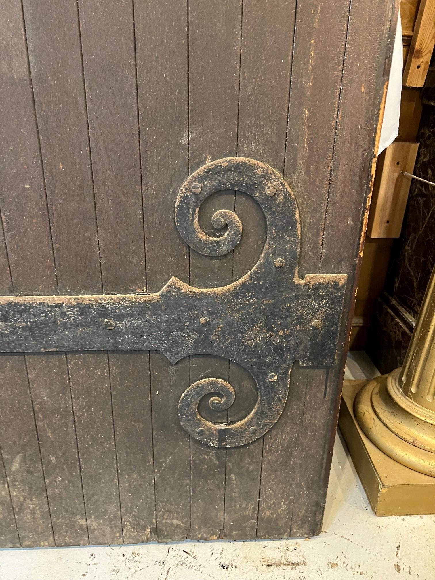 American Early 20th Century Antique Oversize Door with Large Iron Hinge For Sale