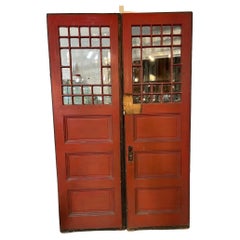 Early 20th Century Antique Pair of Entrance Doors with Beveled Glass Panels