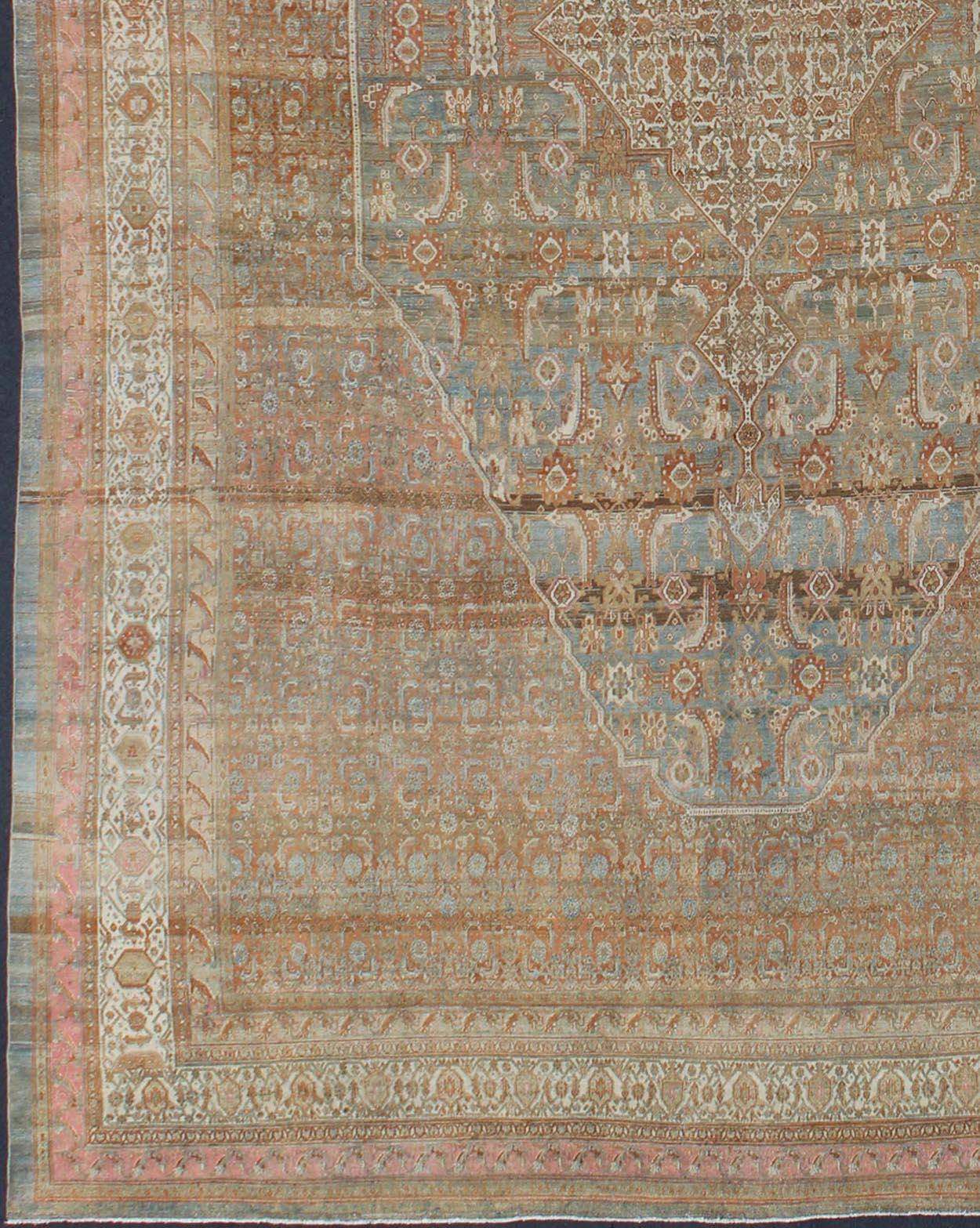 Early 20th century antique Persian Bibikabad Hamadan rug in light blue background, brown, salmon, cream, taupe and charcoal. 
Early 20th century antique Persian Bibikabad rug with large Medallion and Herati motifs throughout the rug, rug kb-180701,