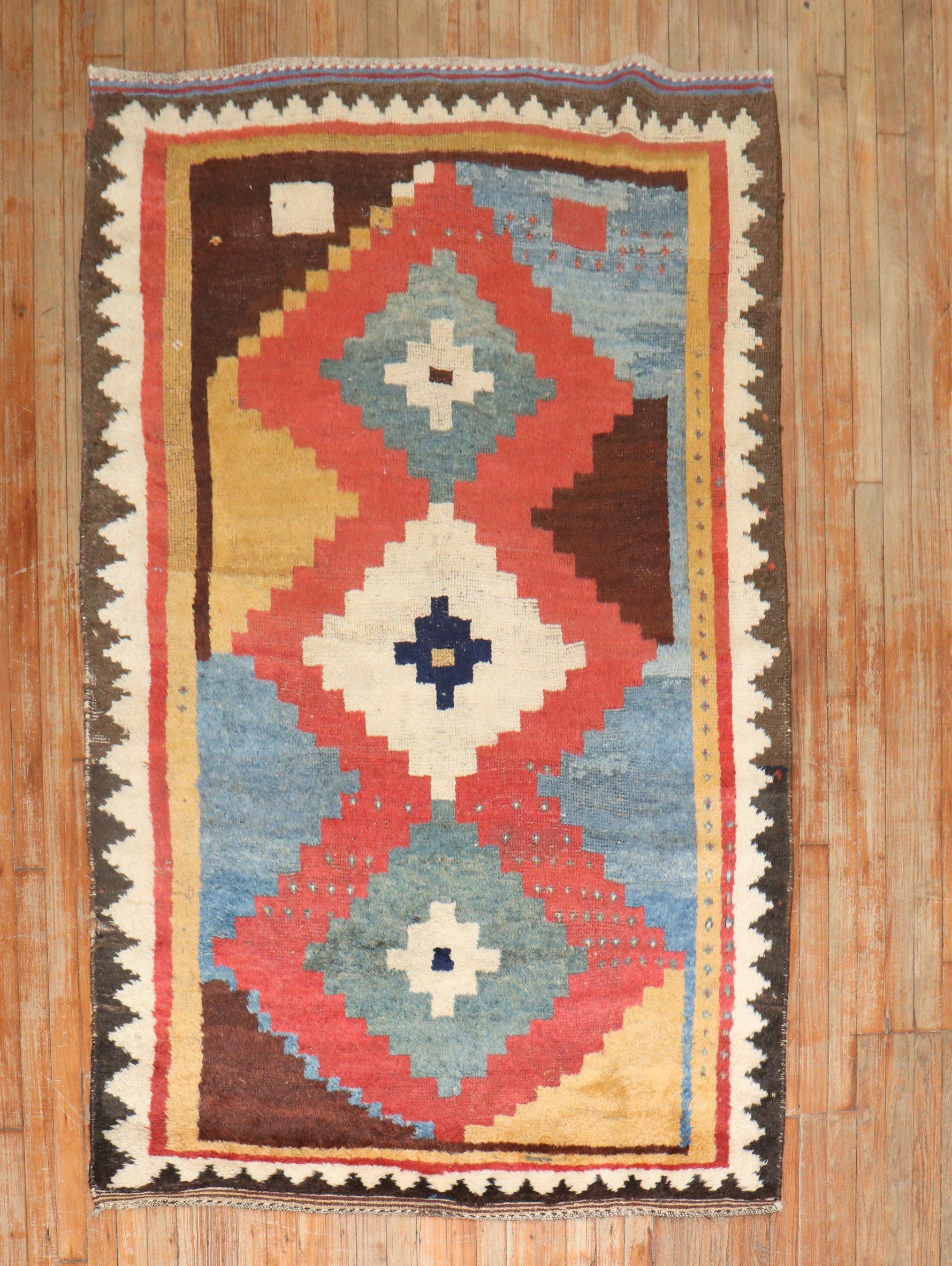 An early 20th century Persian Gabbeh accent-size geometric rug originating from the JP WILLBORG collection in Europe.

Measures: 4'5'' x 7'.