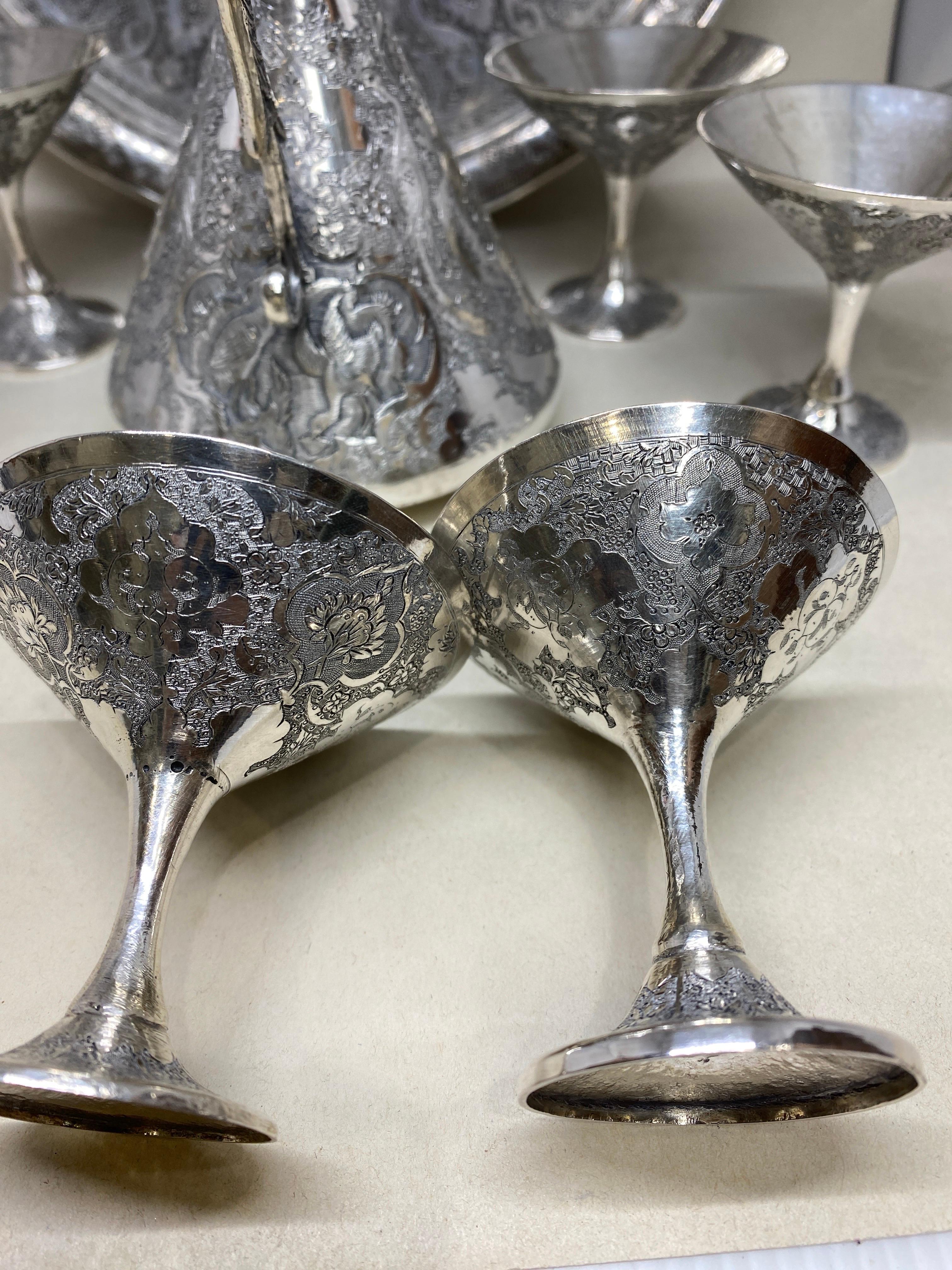 Early 20th Century Antique Persian Hand Chased Silver Decanter, Cup Tray Set In Good Condition For Sale In Bernardsville, NJ