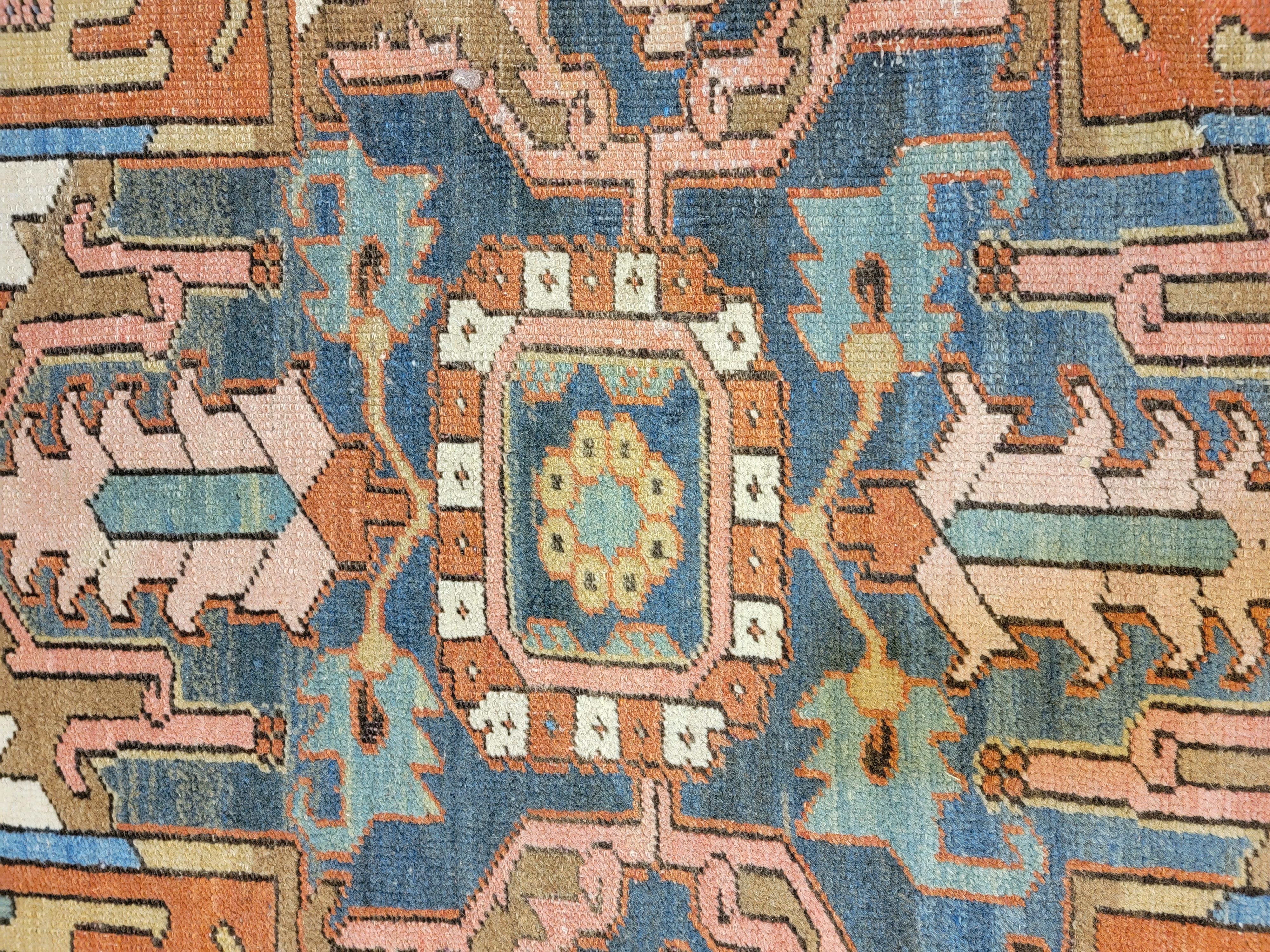 Absolutely Unique and rare 100 year Persian Serapi Rug with an Ivory background. Original Serapi design.
Age apparent patina, well distributed different color percentages of the whole, no dominant color.

Size: 9'8