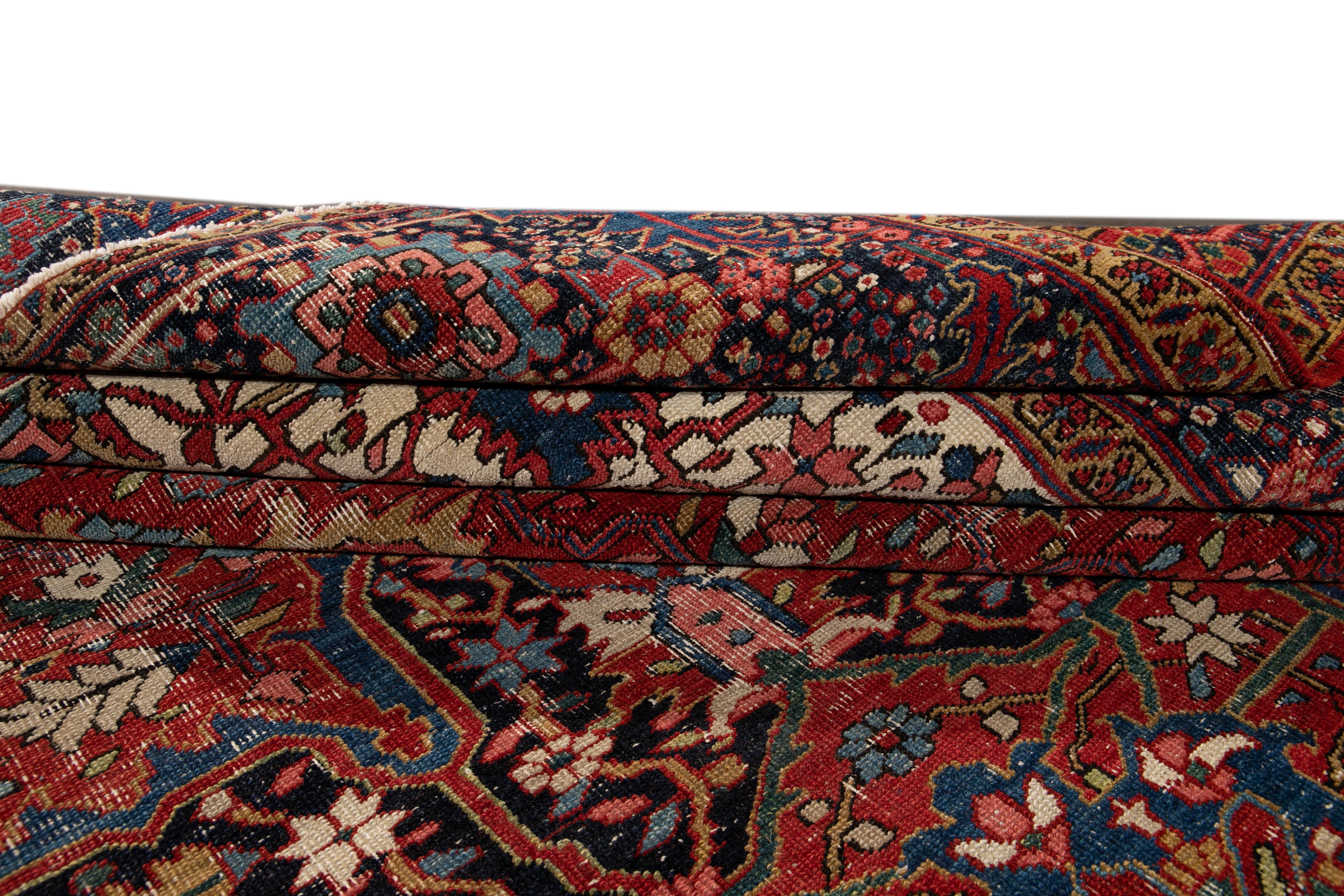 Early 20th Century Antique Persian Heriz Wool Rug In Distressed Condition In Norwalk, CT