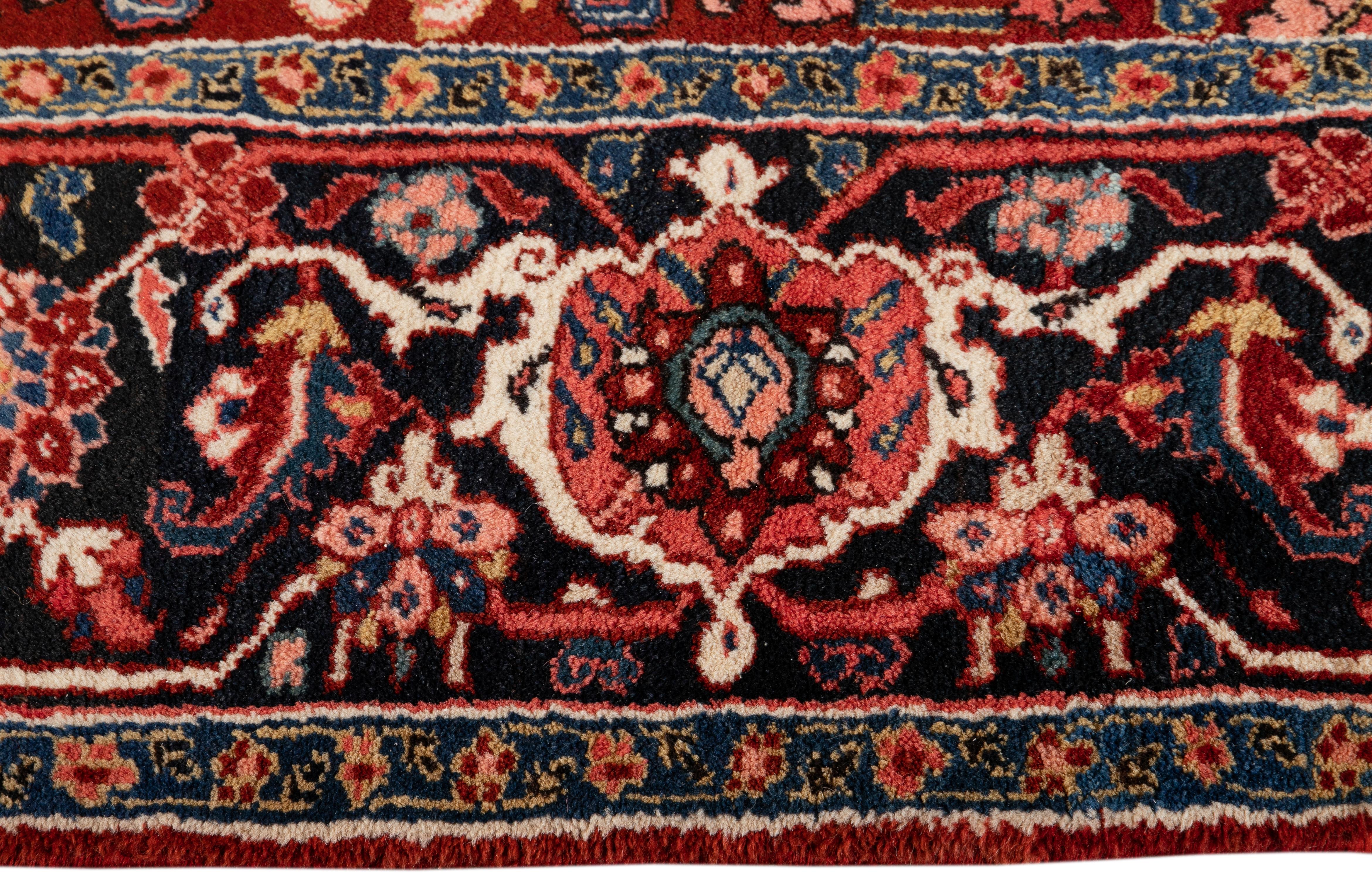 Early 20th Century Antique Persian Heriz Medallion Handmade Red Wool Rug For Sale