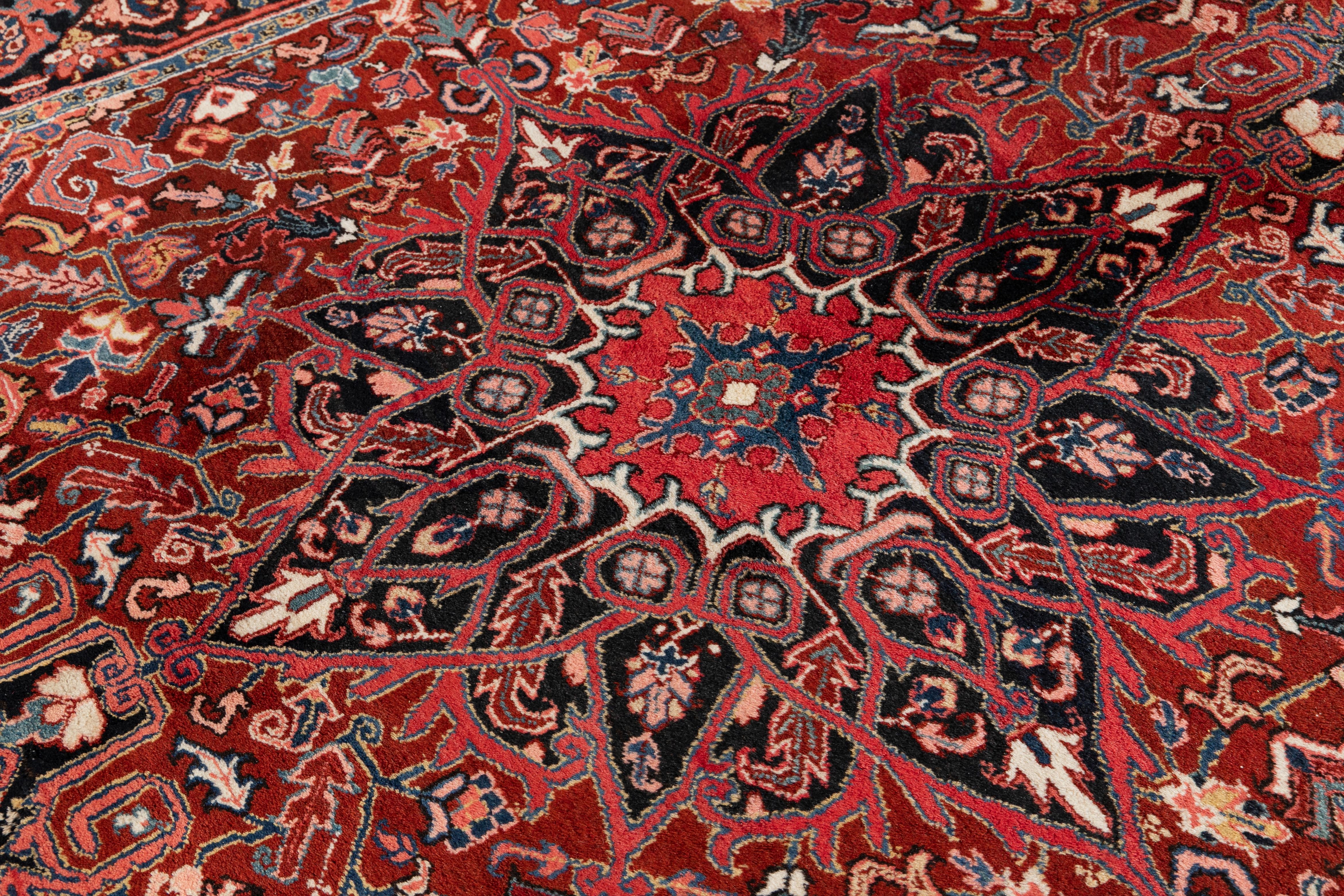 Antique Persian Heriz Medallion Handmade Red Wool Rug For Sale 3