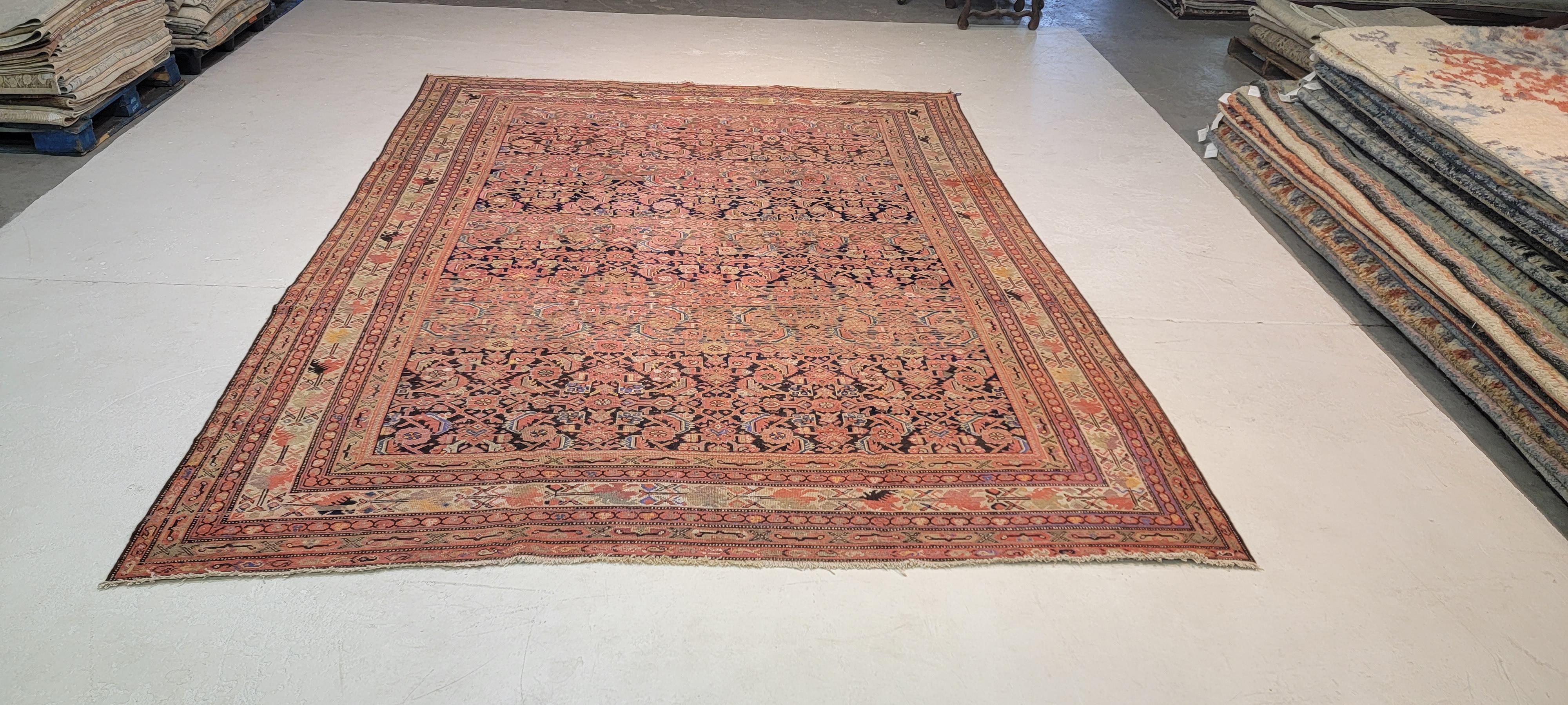 Traditional all over Herati design with Patina and decorative abrash. Very unique in size for Malayer.

Size: 9'9