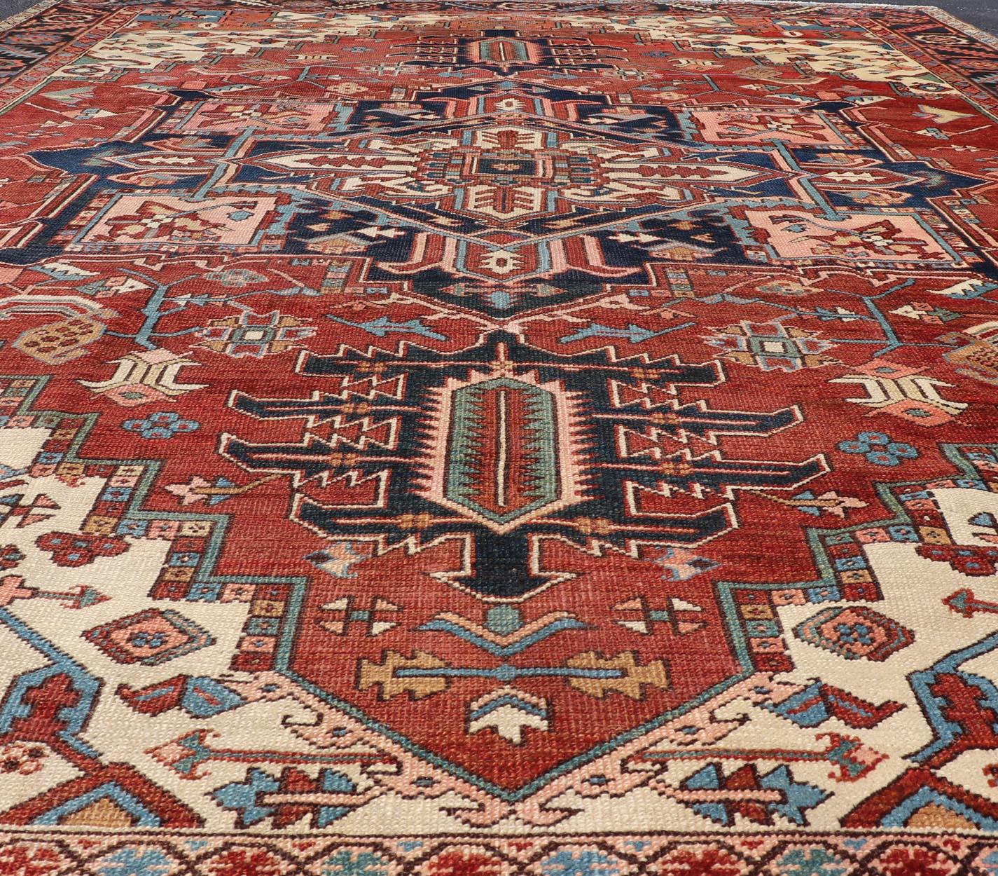 Hand-Knotted Early 20th Century Antique Persian Serapi Carpet with Stylized Geometric Motifs For Sale
