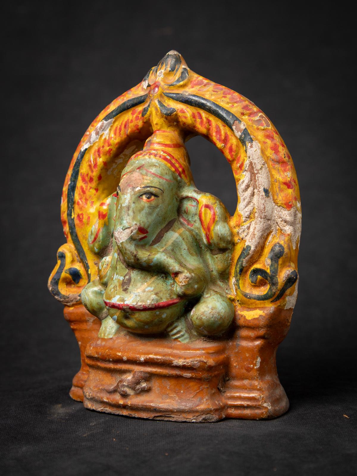 The Antique pottery Ganesha statue is a remarkable and spiritually significant artifact originating from India. Crafted from Pottery, each statue stands at 17 cm in height and measures 13,3 cm in width and 6 cm in depth. 

Created in the Early 20th