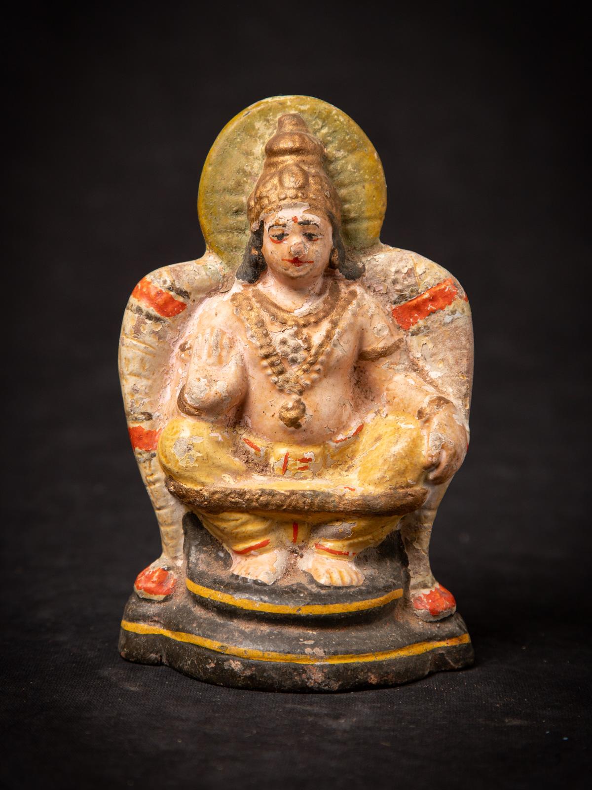 This antique pottery Vishnu statue is a rare collectible masterpiece originating from India, crafted in the early 20th century. Made from high-quality pottery, the statue measures 16.2 cm in height, 10.3 cm in width, and 7.5 cm in depth, with a