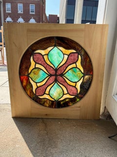 Early 20th Century Antique Round Stained Glass Window in a New Wood Frame