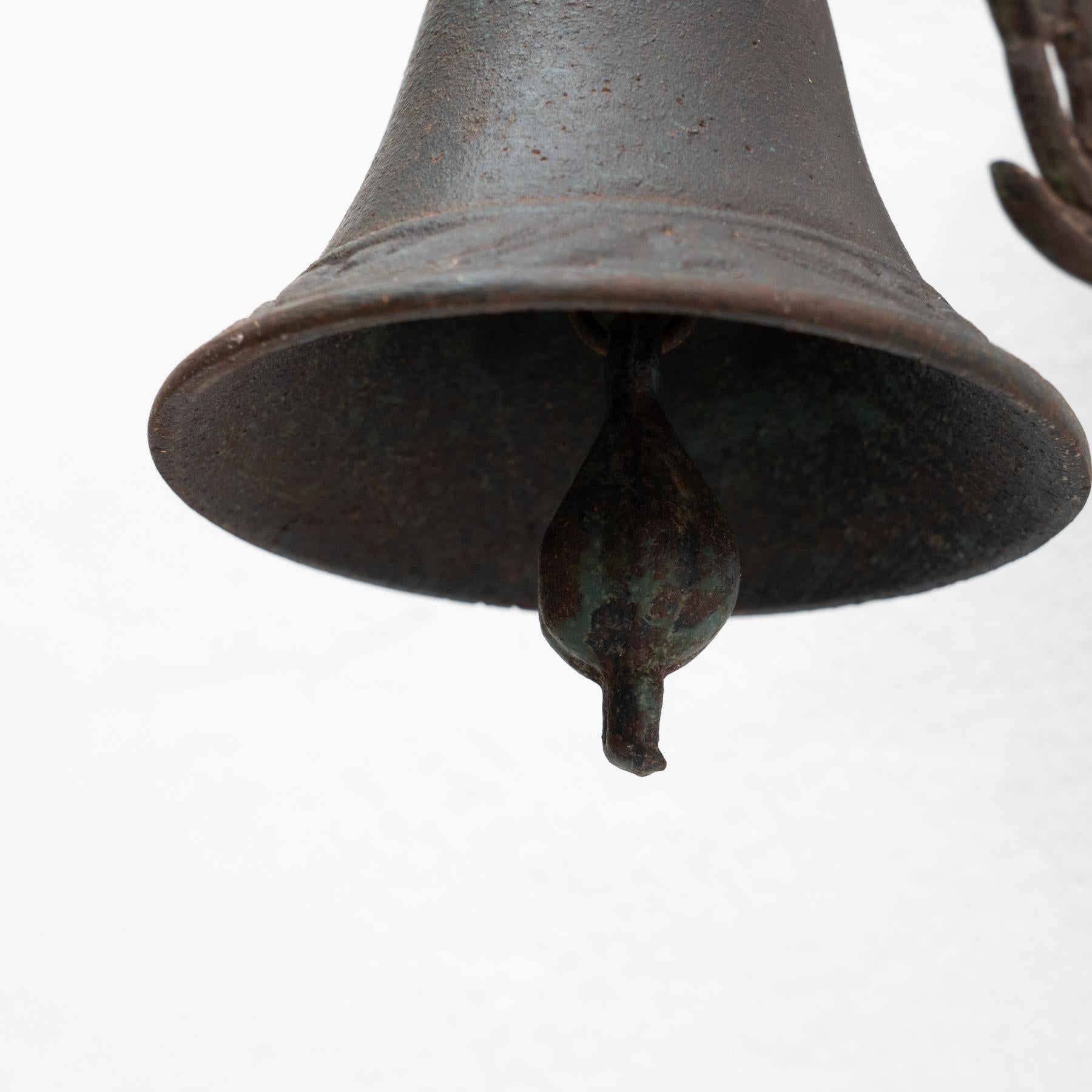 Early 20th Century Antique Rustic Spanish Wall Cast Iron Decorative Bell For Sale 6